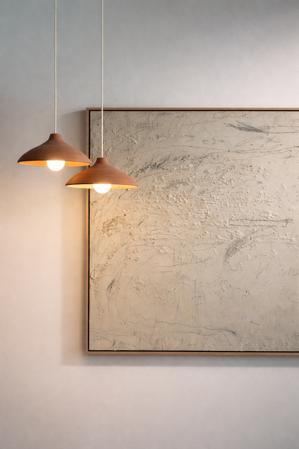 pendant lights and abstract art.png