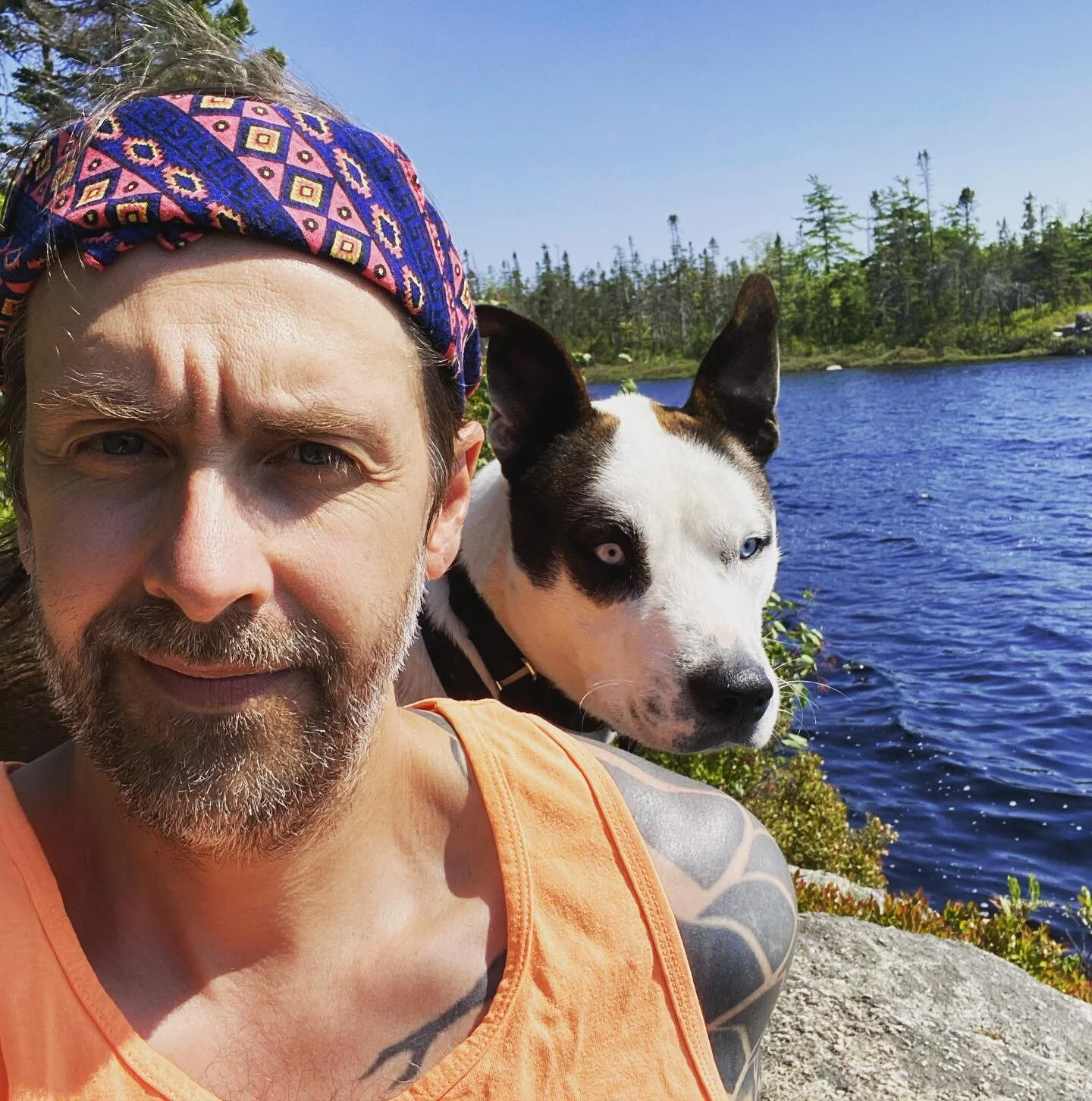 Me and little baby beauty boy, lakeside. Only thing missing is his human mommy Michelle. He doesn&rsquo;t like to be closer to the water than this. We&rsquo;re working on it though. #dog #lake #rock