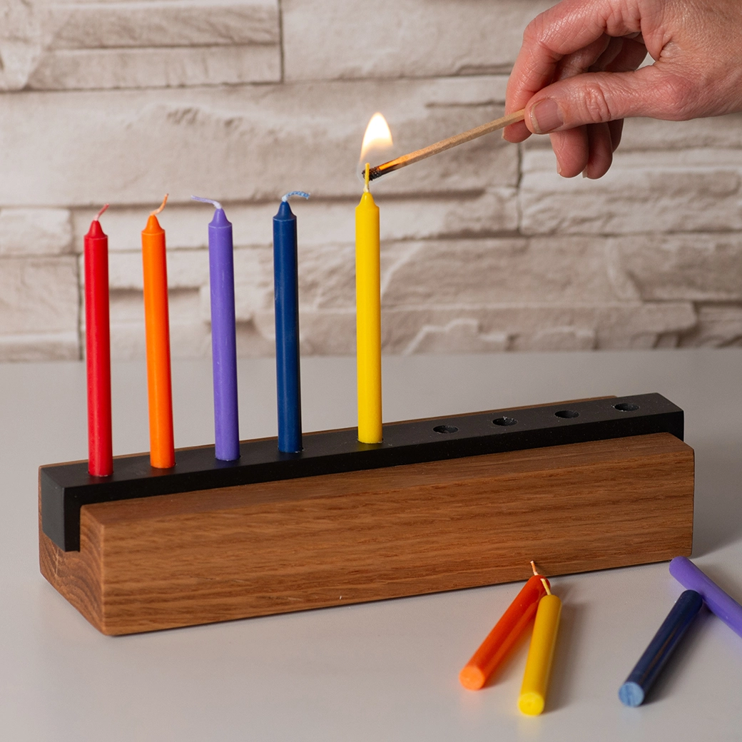 GoodLight Rainbow Hanukkah Candles Box Lit.png