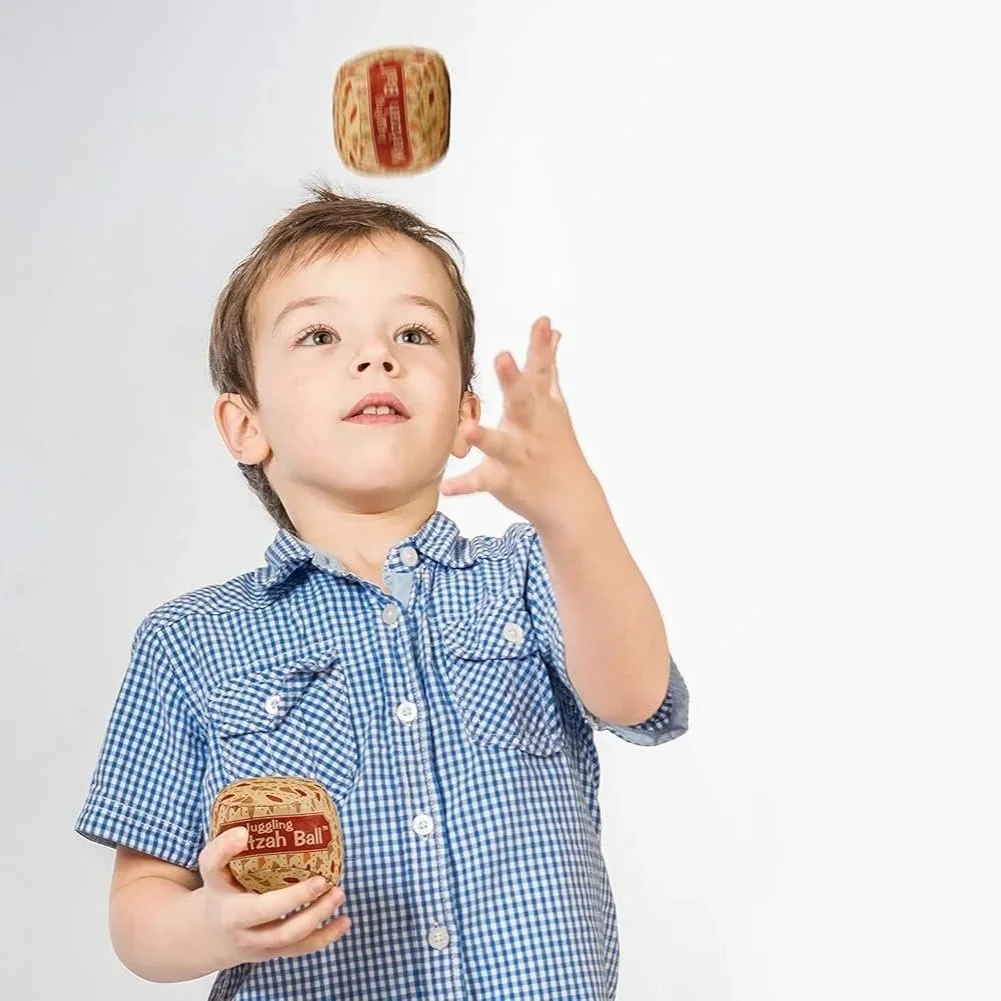Juggling+Matzah+Balls+Child.jpg