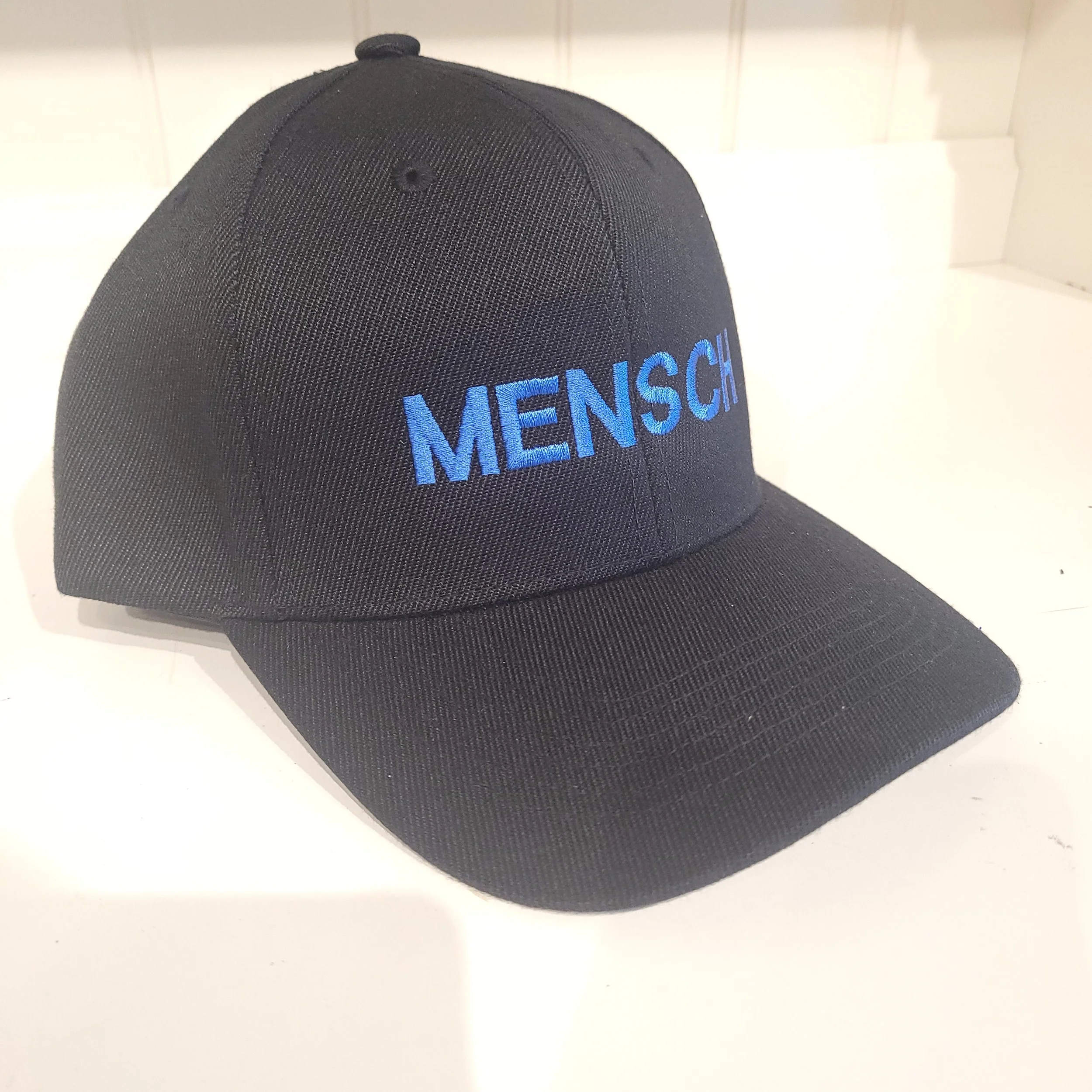 Mensch Blue Cap Side.jpg