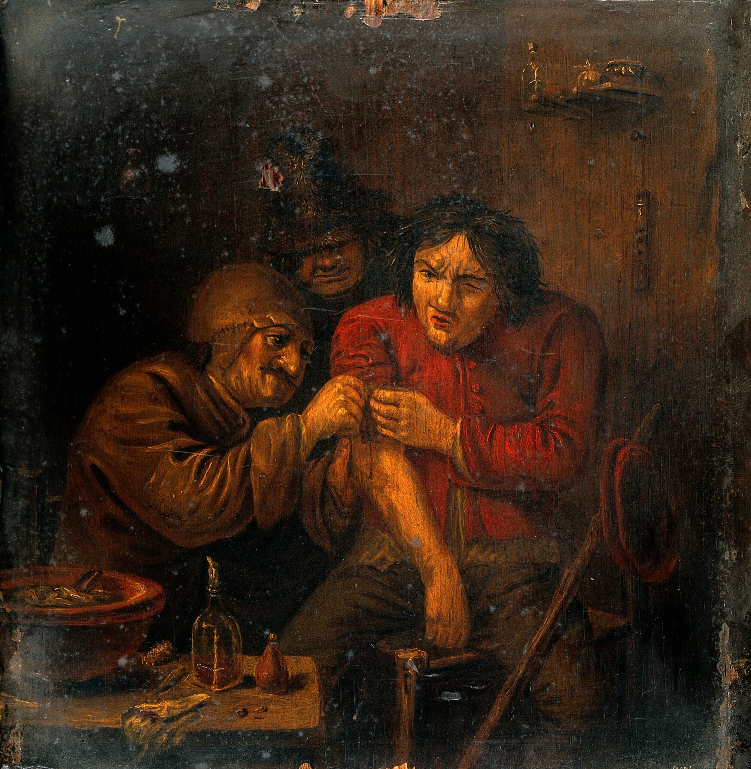 A_surgeon_attending_to_a_mans_arm._Oil_painting_after_Adria_Wellcome_V0018197-scaled.jpg