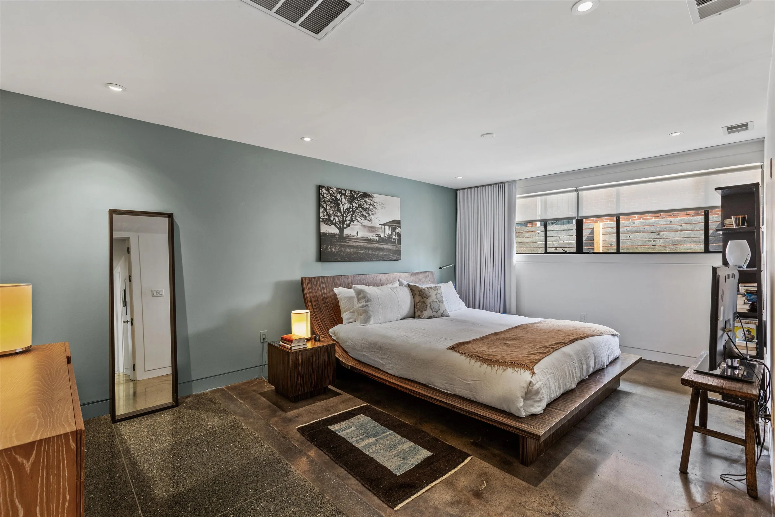 Primary bedroom with ribbon window