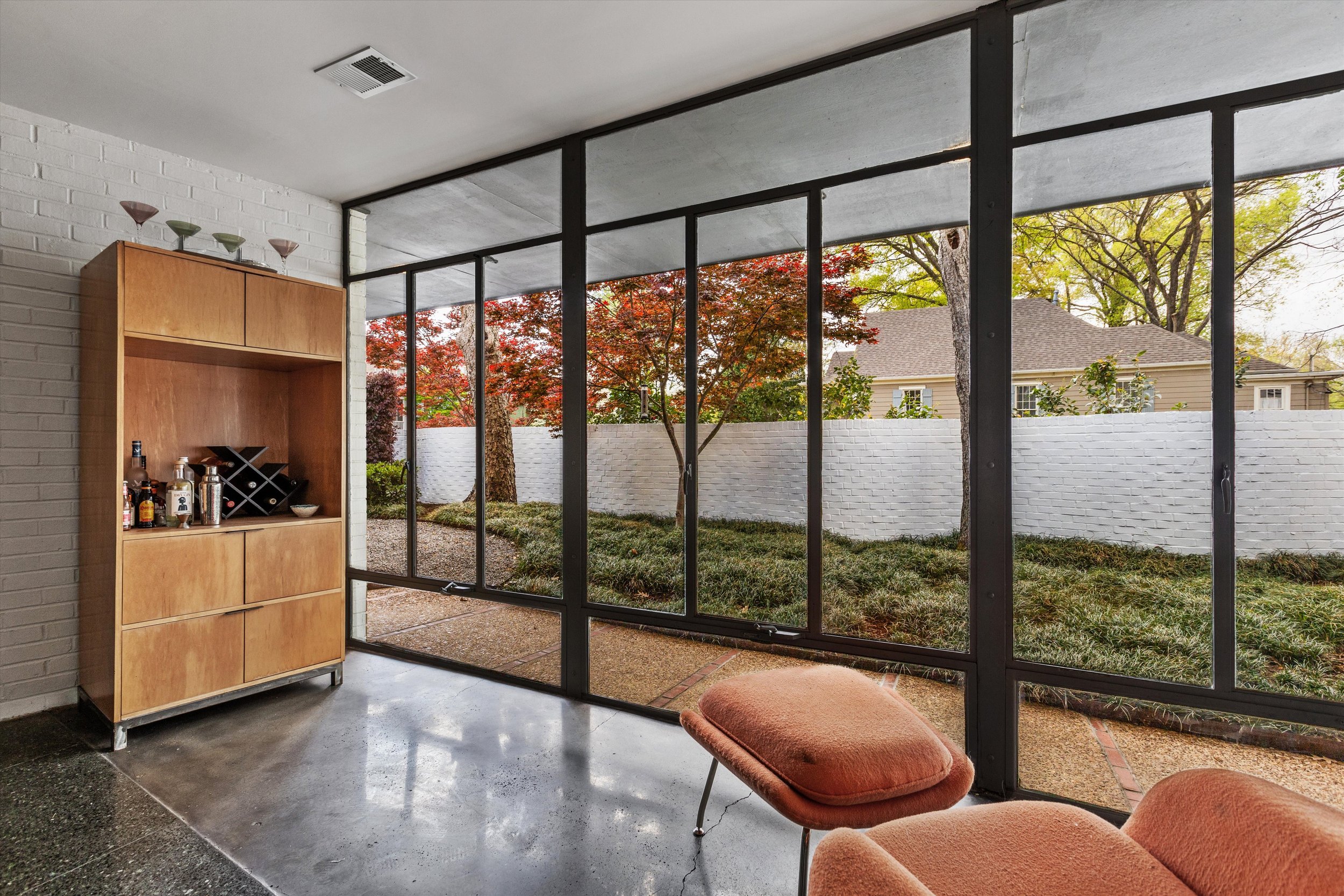 Floor to ceiling windows embrace the view