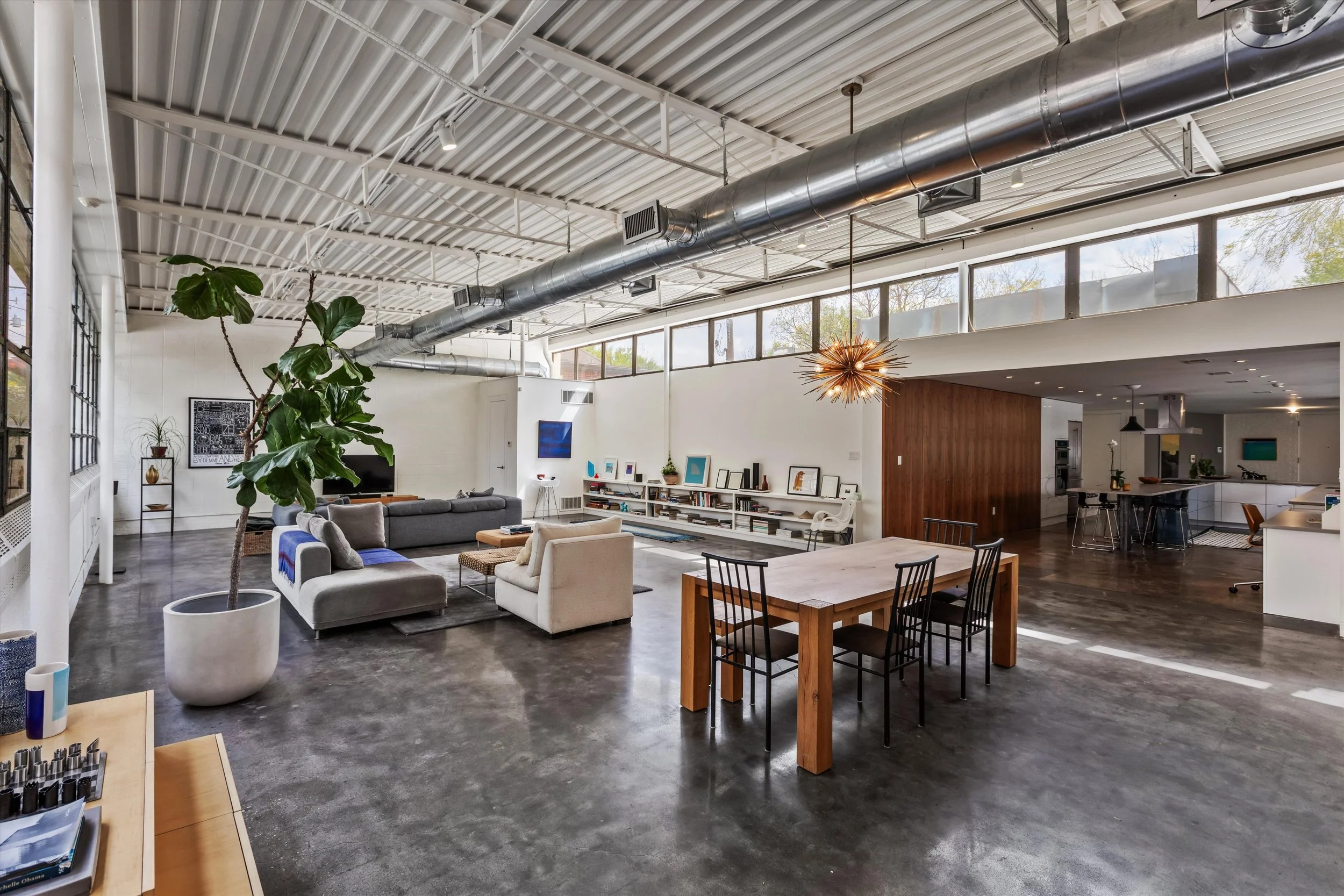 Clerestory windows spill light into the living room