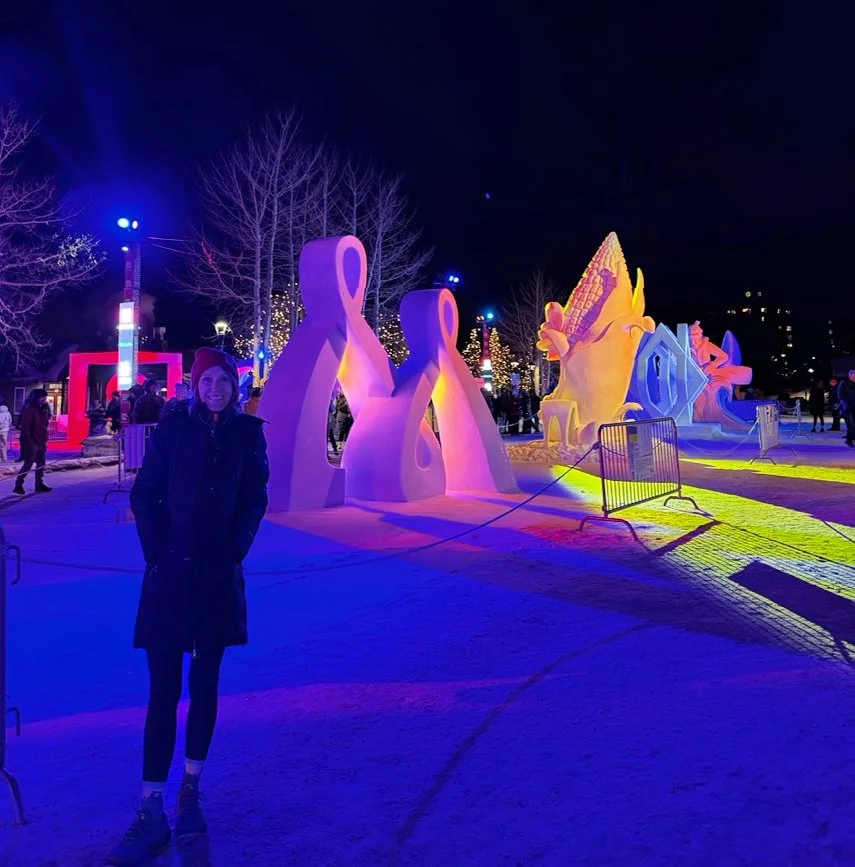 woman by ice sculptures