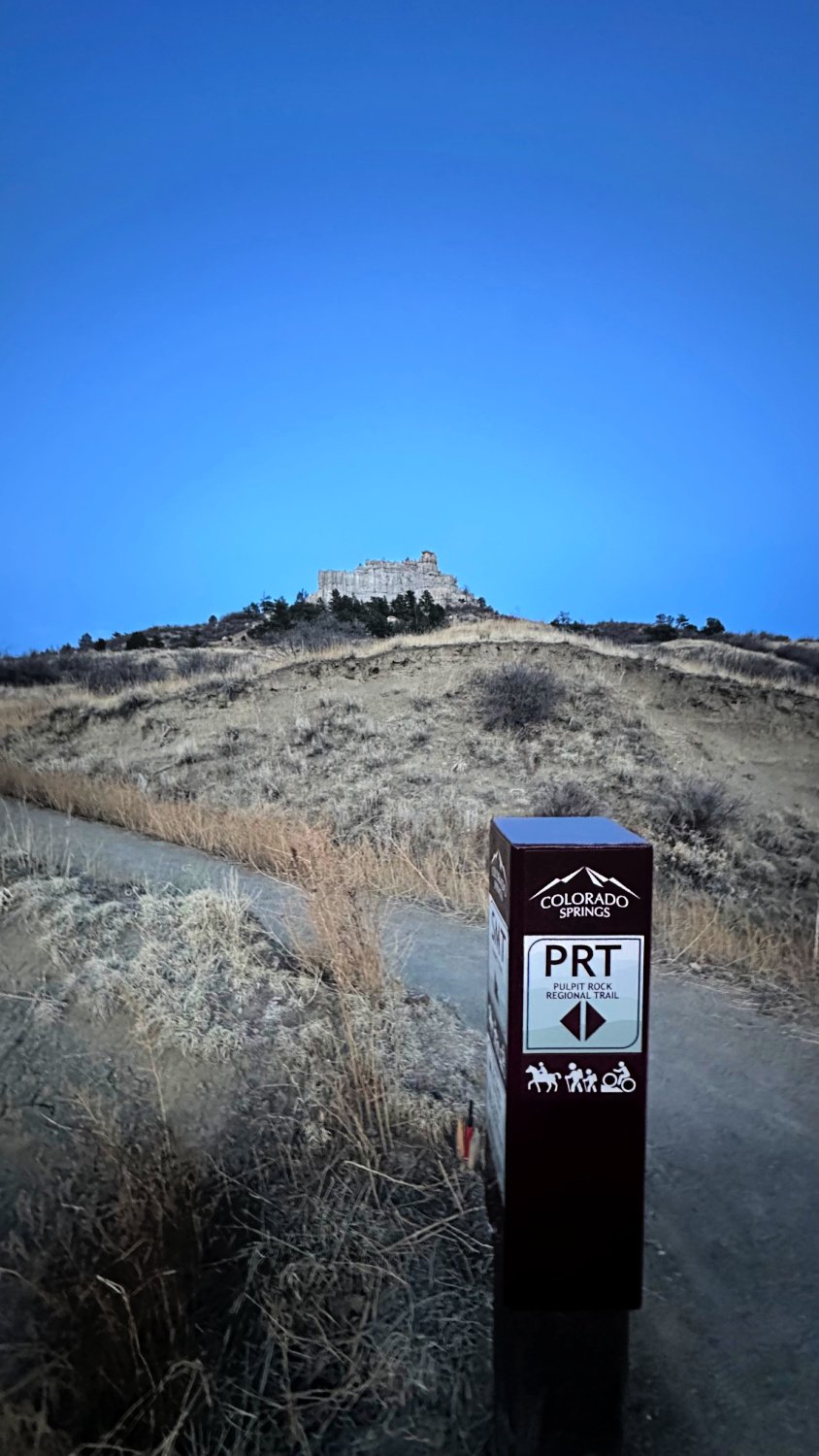 New trail signs marking path to summit