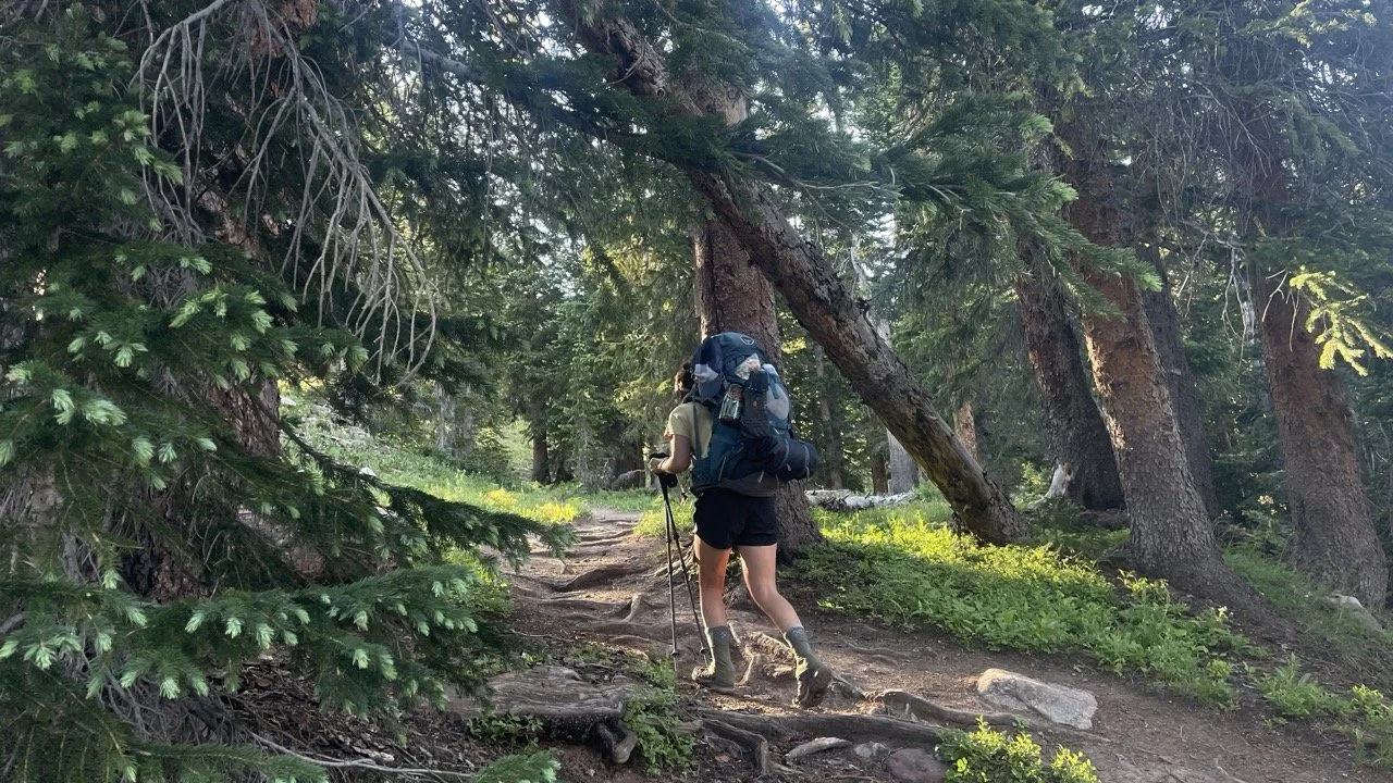 woman backpacking colorado trails