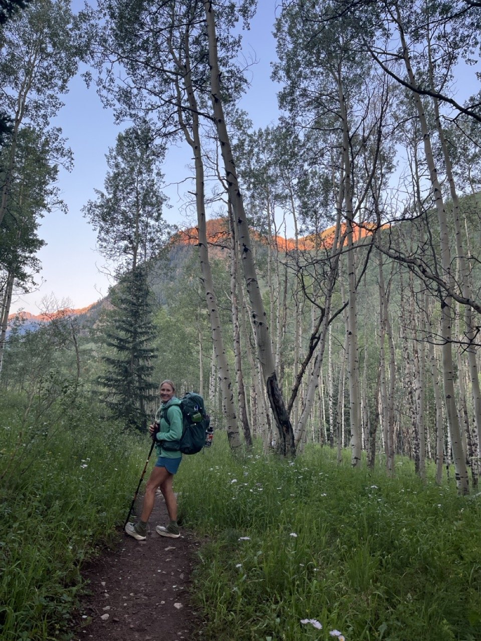 woman with trekking poles