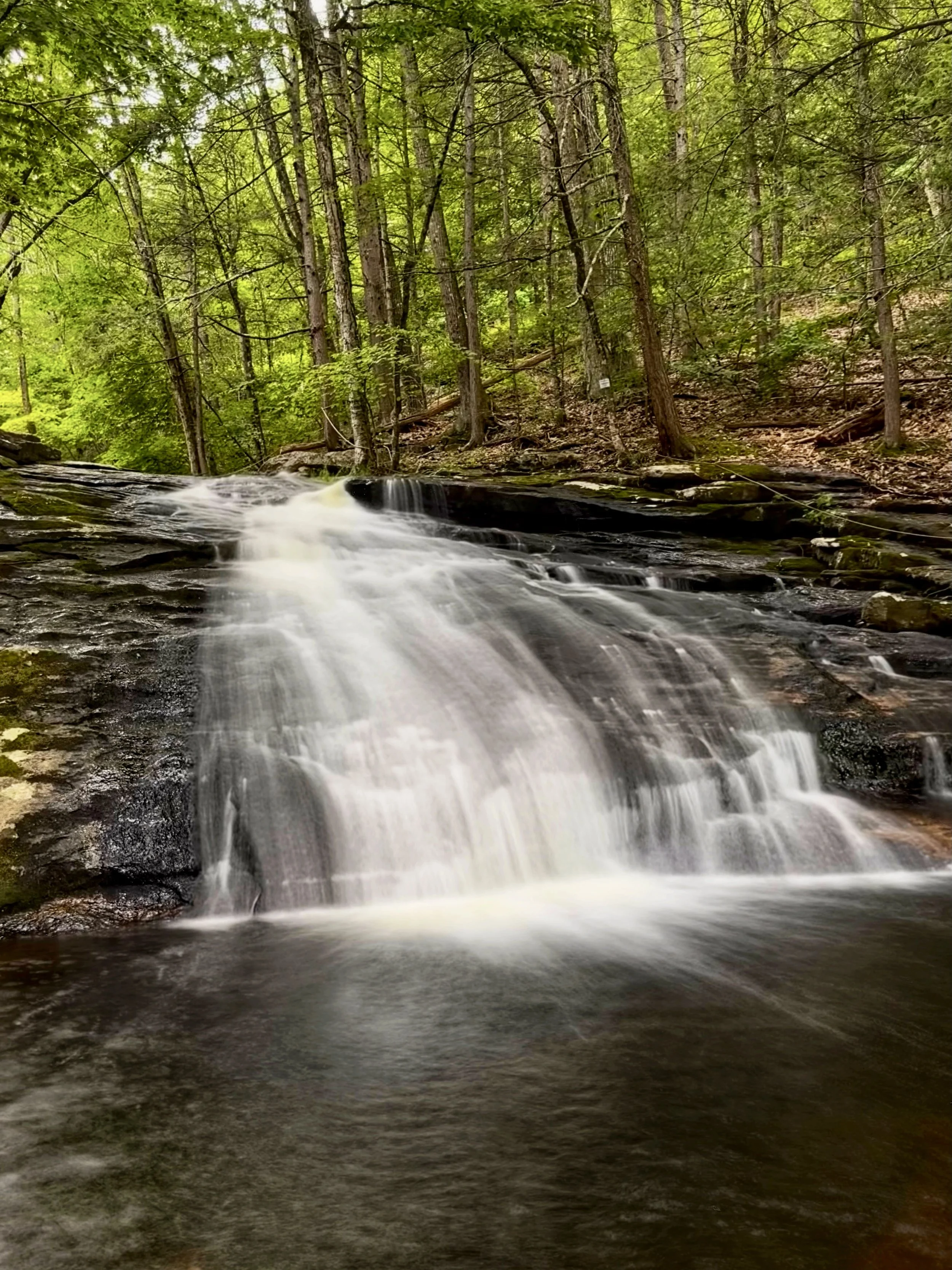 The second CHapel Brook Falls cacade rushing over a rocky ledge in Ashfield, Massachusetts