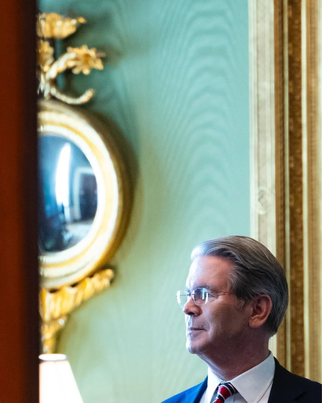 Scenes from Washington 
&bull;

1. Treasury Secretary Scott Bessent speaks to Vice President J.D. Vance (out of frame) inside the White House Green Room moments before Trump and Macron enter the East Room for a joint news conference.

2. President Tr