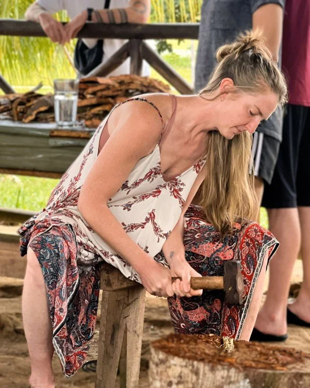 guest pounding ayahuasca vine at casa-review.jpg