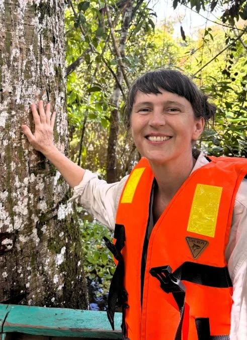 guest hands on tree smiling at casa-review.jpg
