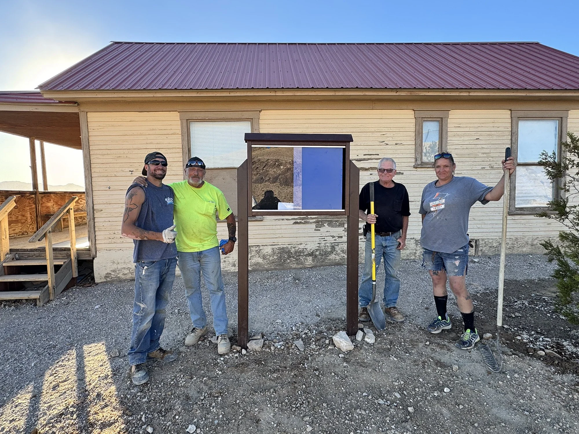 Main sign and display case installation by Eric Stanford and Co.   (Pictured L to R) Friend of crew, Chuck Knode, Eric Stanford & Jetta Lund