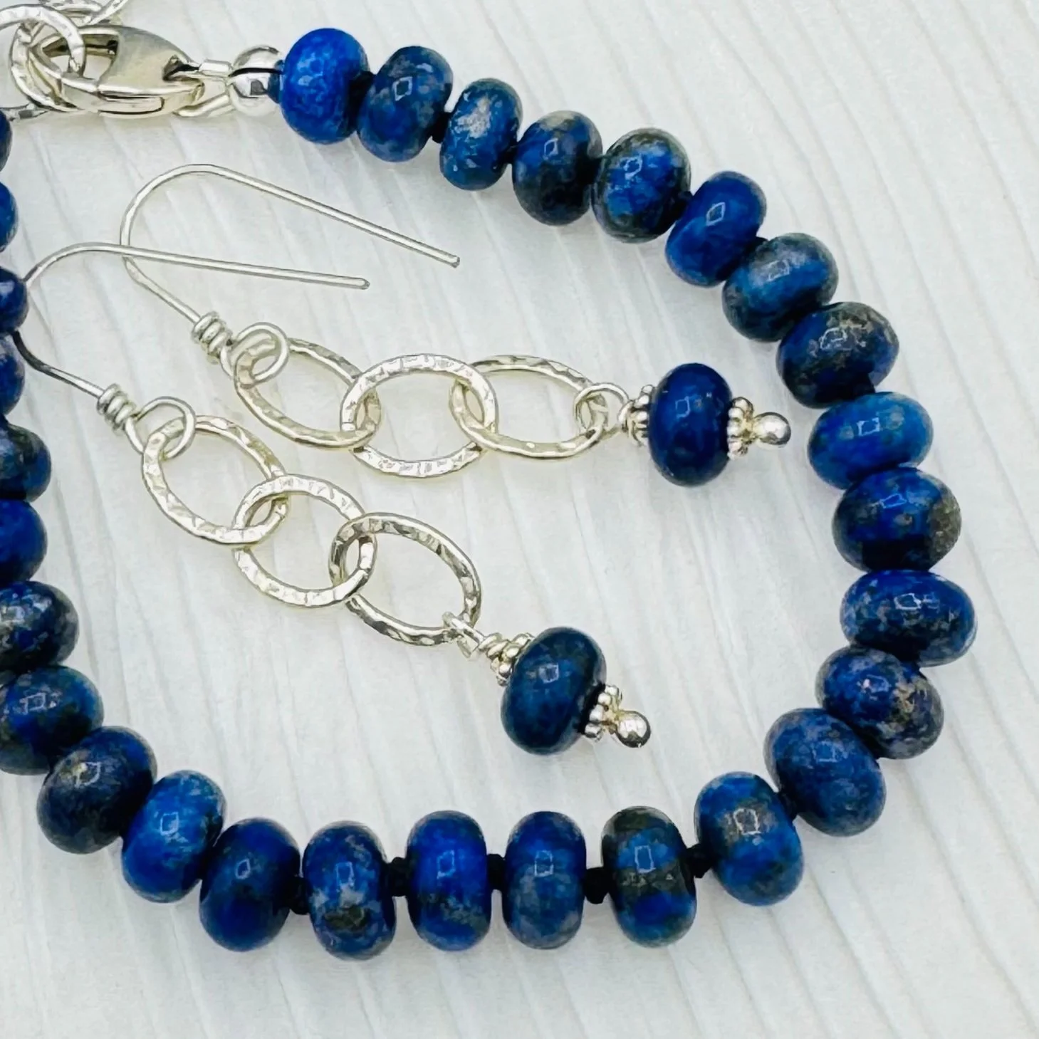 Hand crafted lapis gemstone bracelet and earring set.