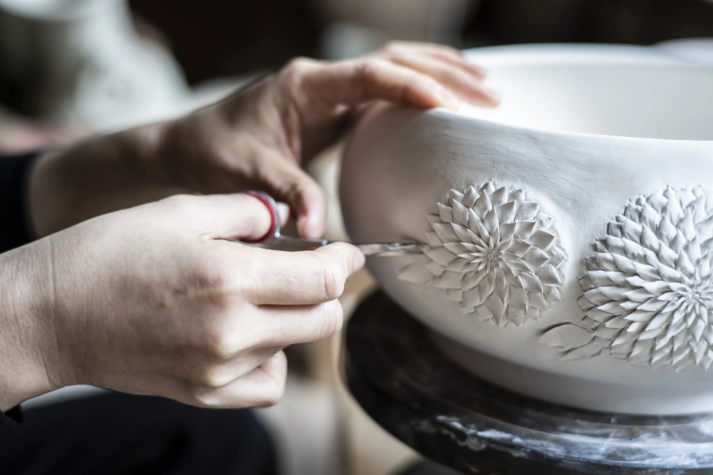 When the Clay Is Cut, a Flower Blooms