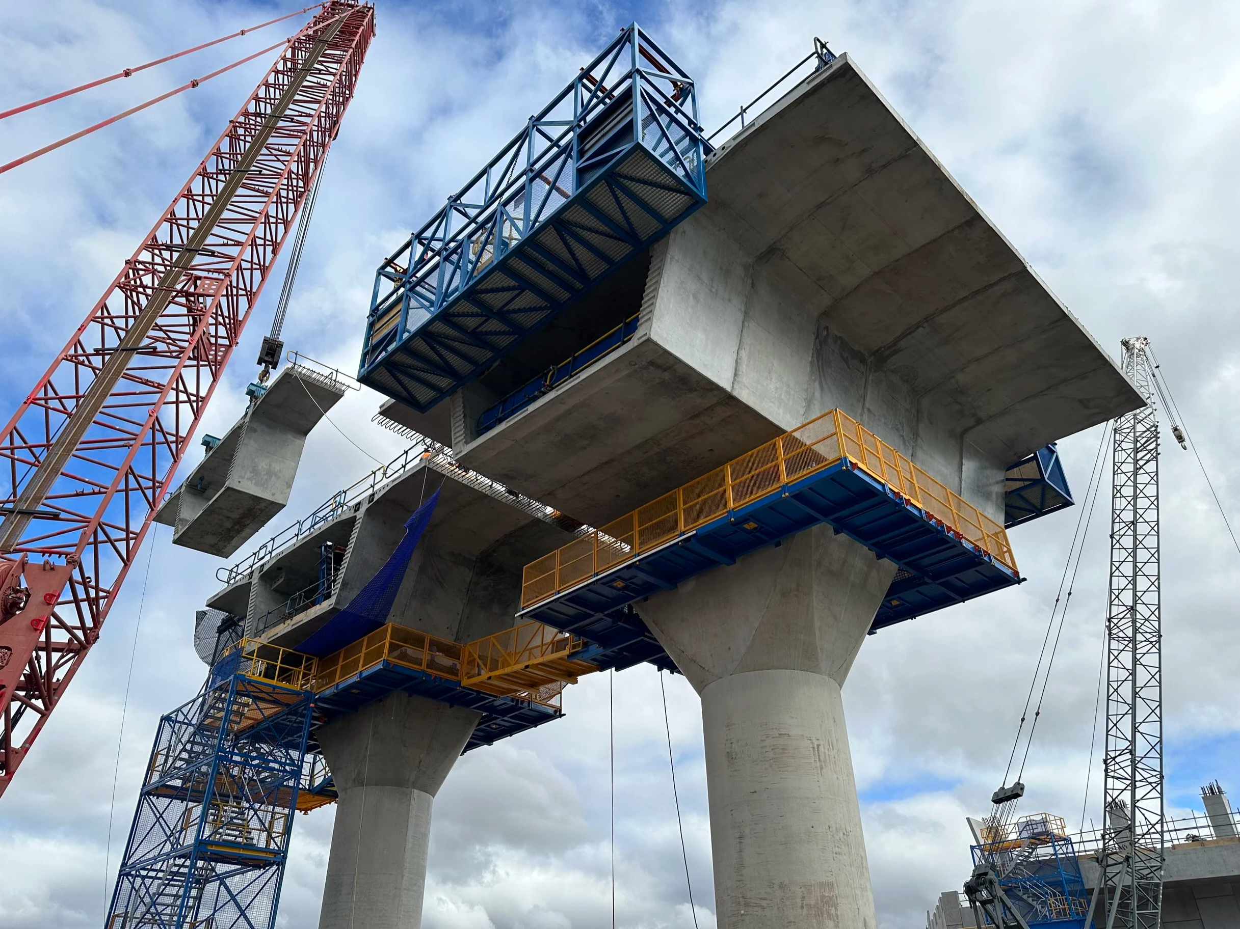 Pier Head Access Platform - Project involved design of a highly custom, crane liftable, platform and connecting bridge used to provide safe access to pier heads during bridge construction works. Due to the complex construction methodology, the design