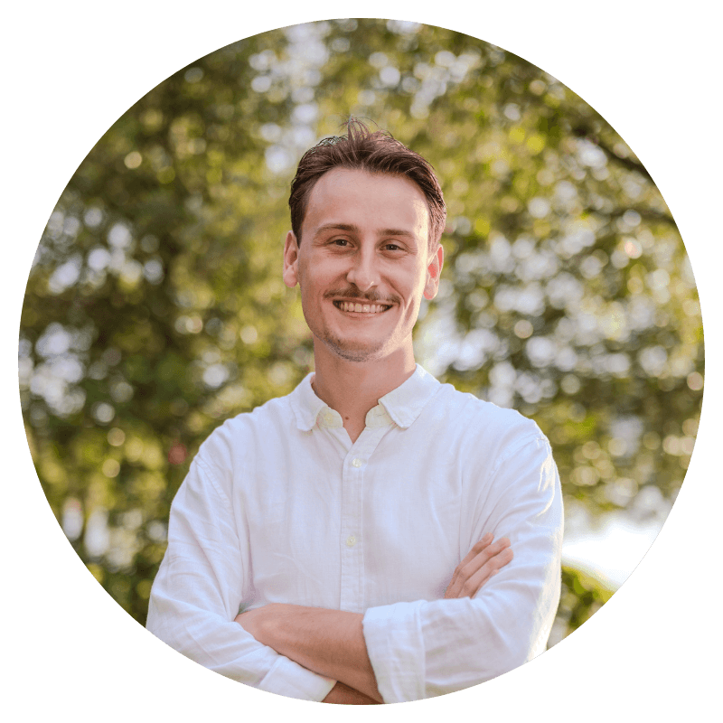 Chiropractor Isaac Hart standing outside