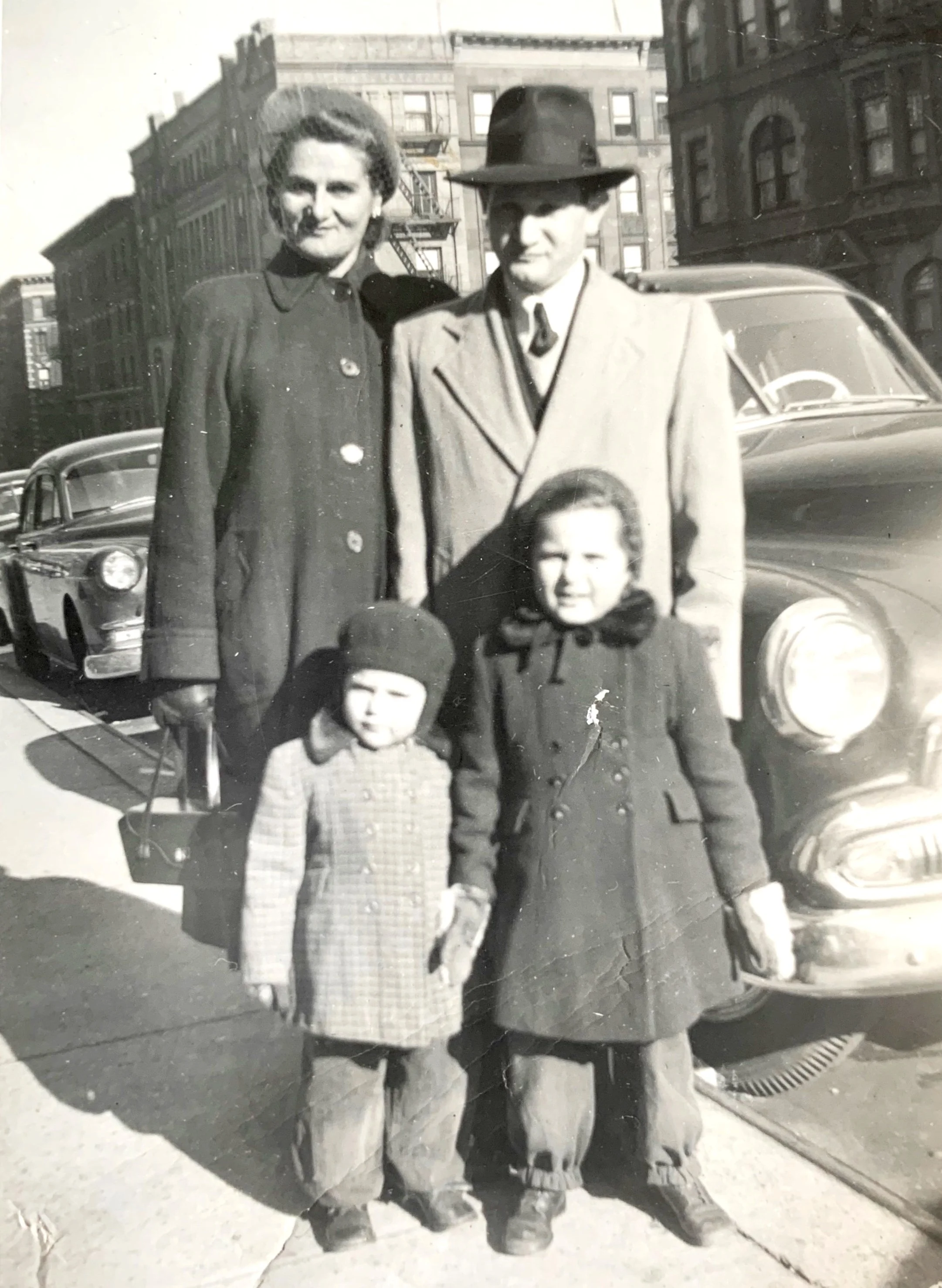 Rachmil and Irene Bryks with their 2 daughters, Miriam (right) and Bella (left) circa 1952