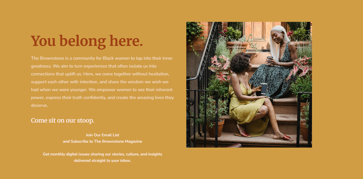 Two black women sitting on front steps of a house, one with platinum blonde hair in a dress, the other with curly hair in a yellow dress, chatting and smiling, surrounded by potted plants.