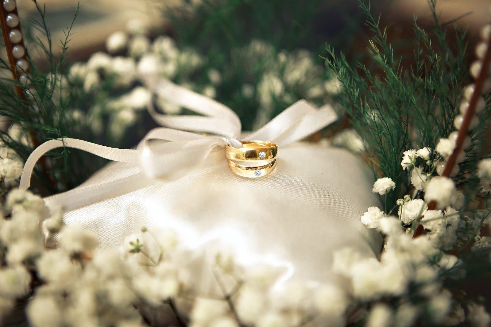 Aerial Perspective Of Elegant Gold Wedding Rings Engagement Ring And Olive  Sprig On Brown Wooden Background, Wedding Ring, Engagement Ring, Groom  Background Image And Wallpaper for Free Download