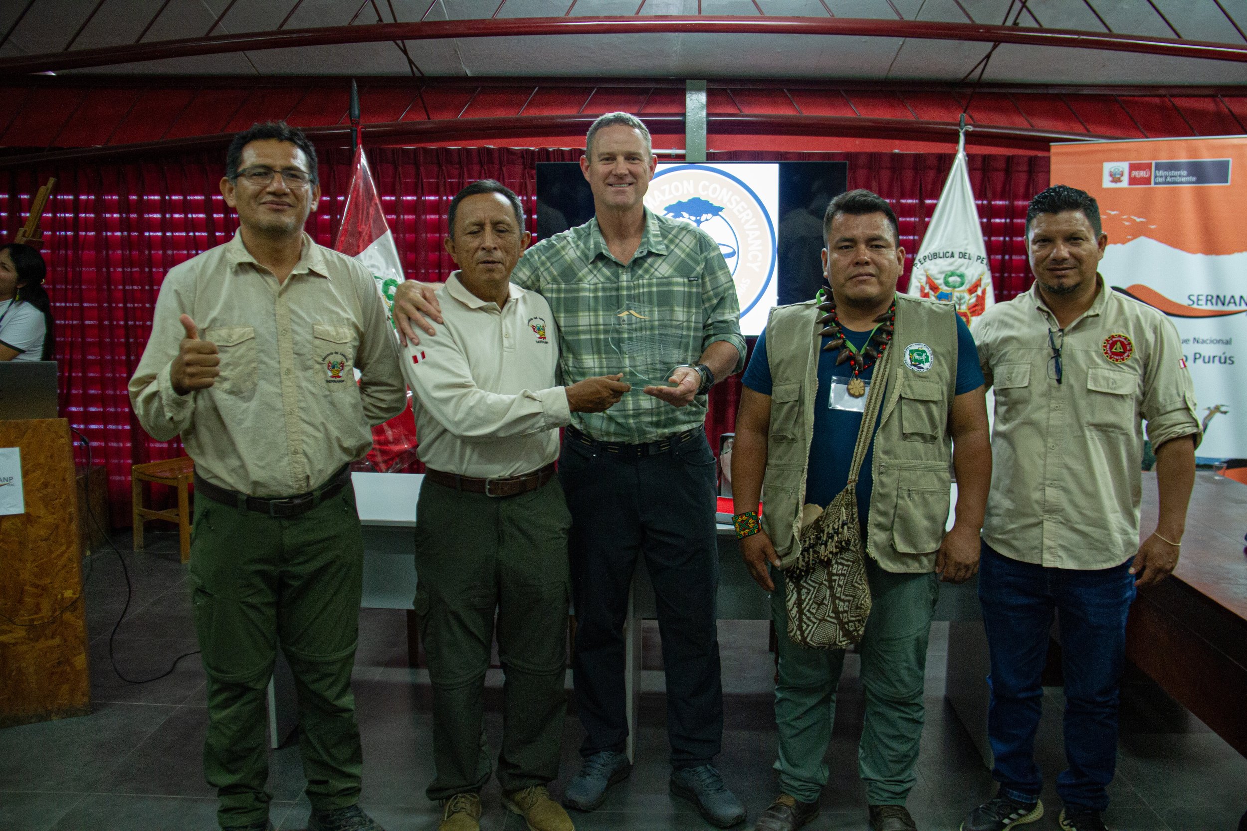 From left to right: Rafael Pino, Chief of the Sierra del Divisor Reserved Zone; Arsenio Calle, Chief of PNAPU; Chris Fagan, Executive Director of UAC; Fernando Aroni, President of ACONADIYSH; and Miguel Camberu, Representative of GERFFS.