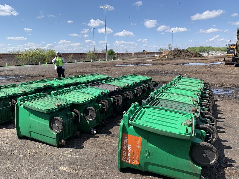   Green toters from NYC drop-off sites empty for cleaning and drying  before going out to sites across the five boroughs. These non-exported food scrap drop-offs (FSDO’s) operated by DSNY are currently experiencing closures in under-served areas due 