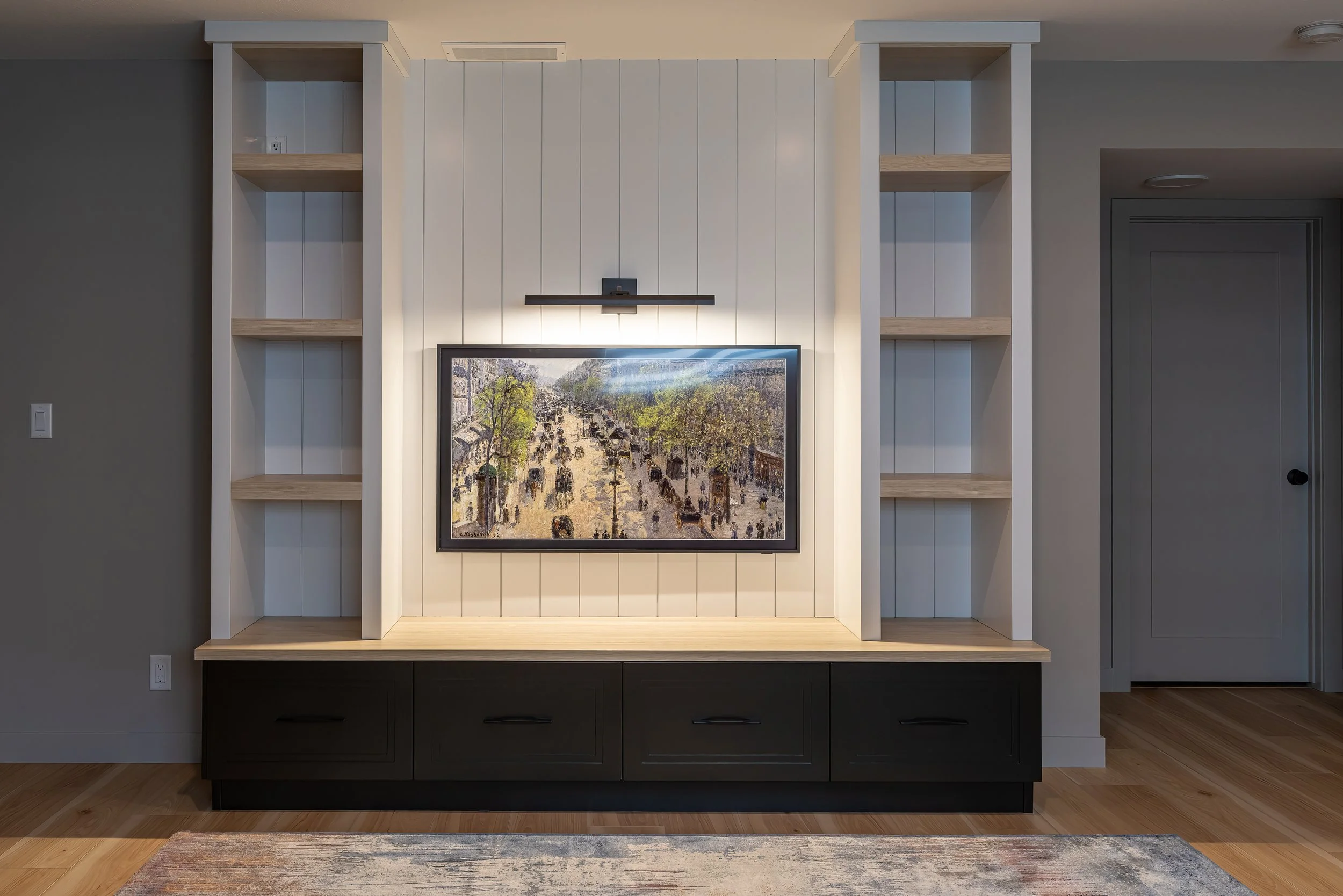 dark green tv stand with shiplap background