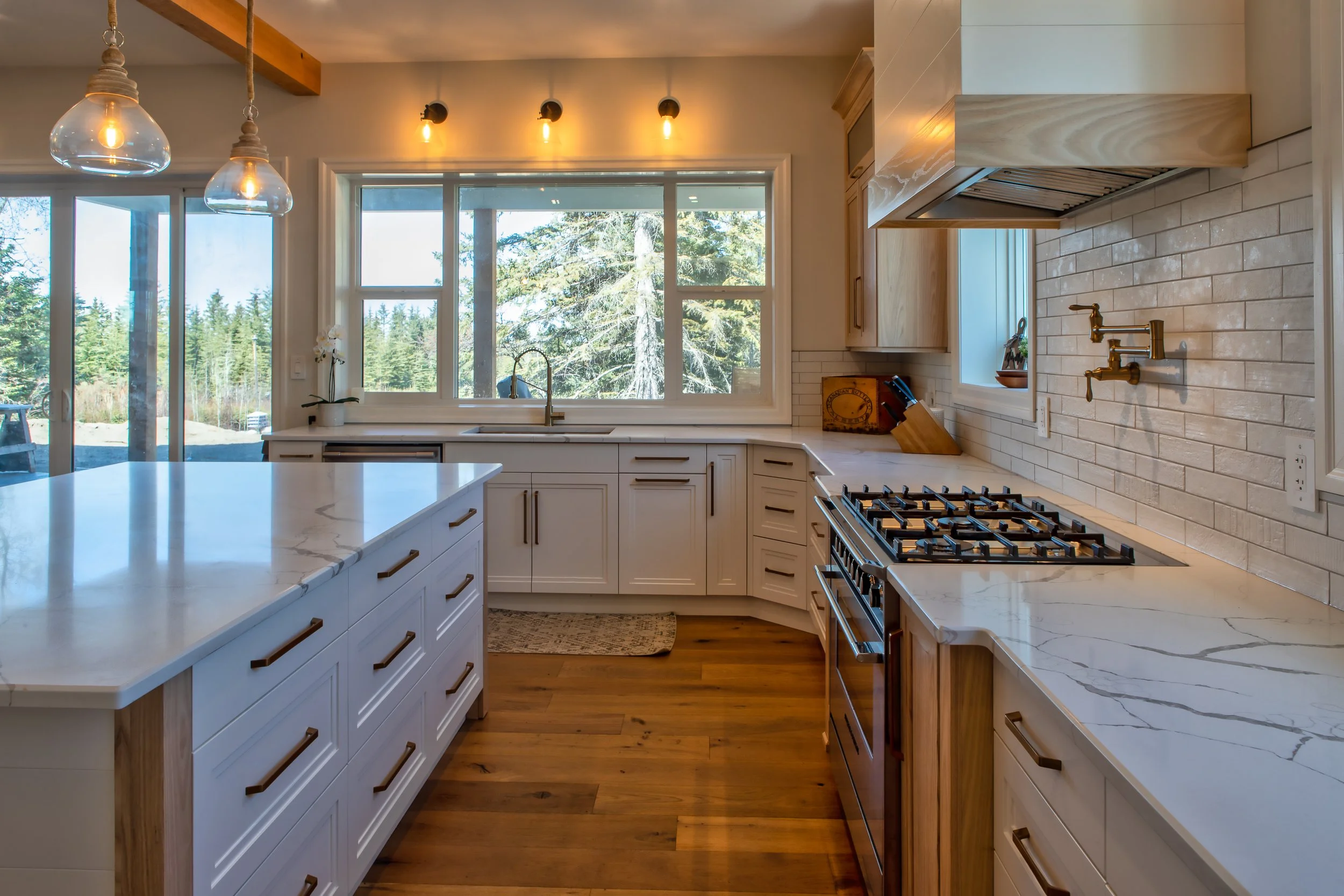 white kitchen with brass handles