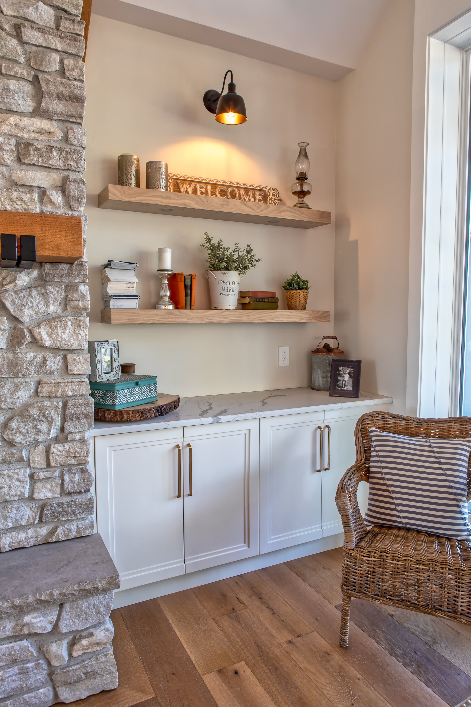 white cabinets with wood floating shelves