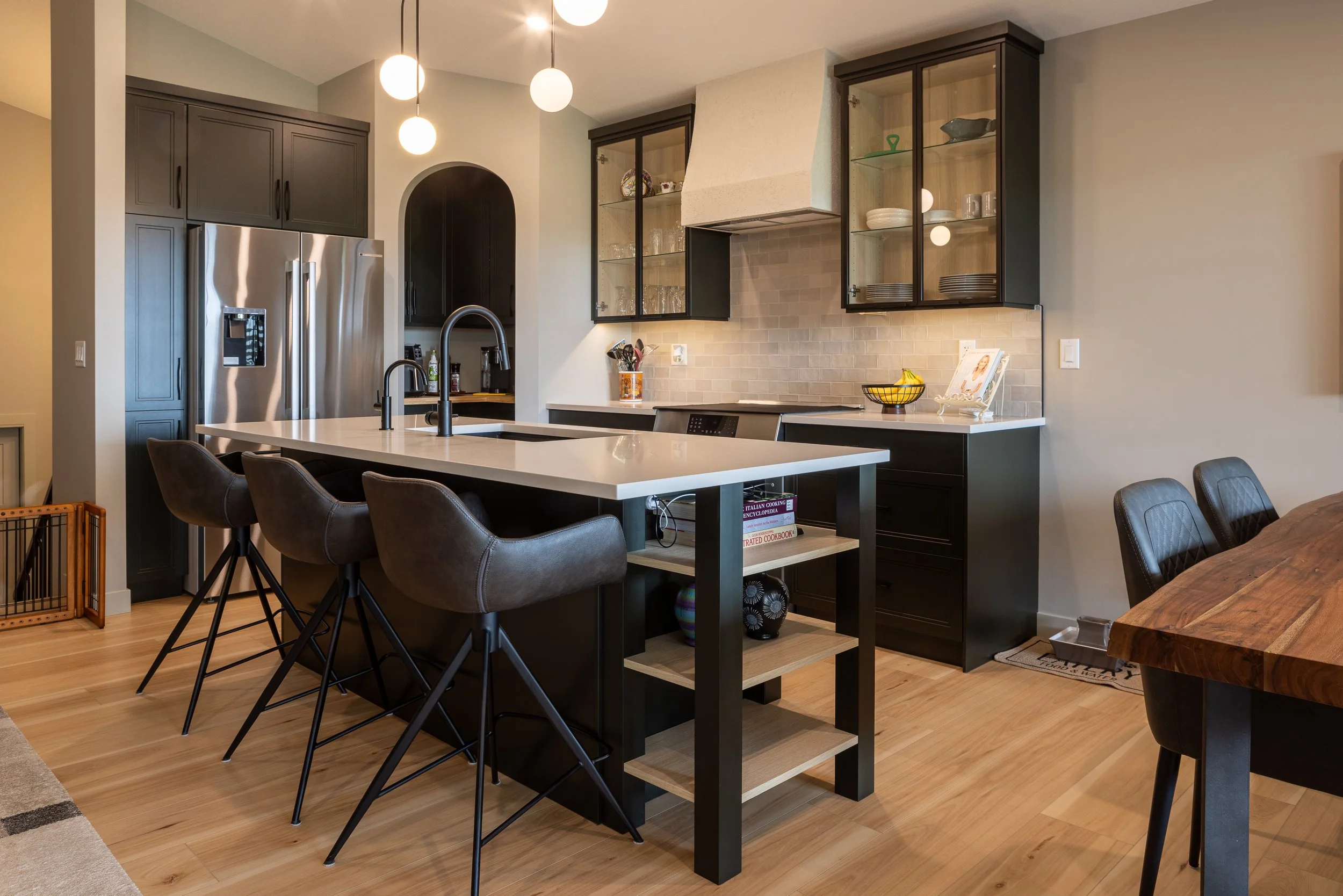 dark green kitchen with blonde floor
