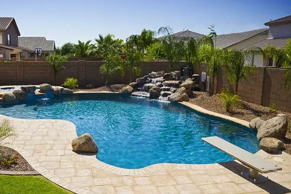 Weekly pool cleaning and maintenance service on a residential backyard pool