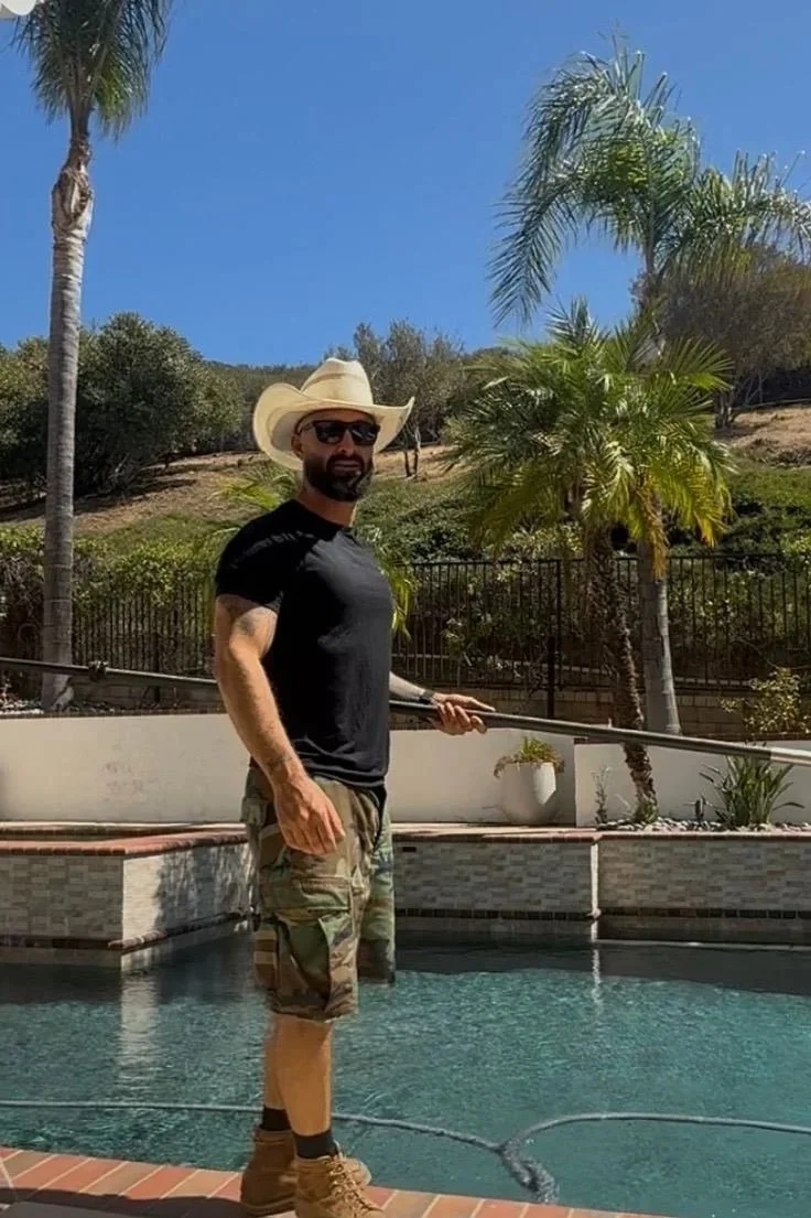Brett Rosa, owner of County Line Pools, servicing a pool in Agoura Hills