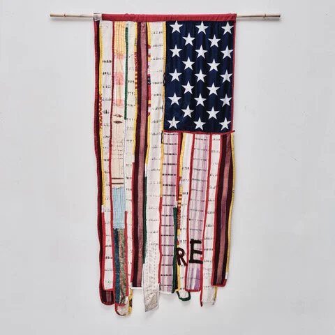 daaPo réo, 2020 I TO I (Two-sided Flag from the Self Portraits series), West African textiles, 60 x 35 inches, Image courtesy of the artist.
