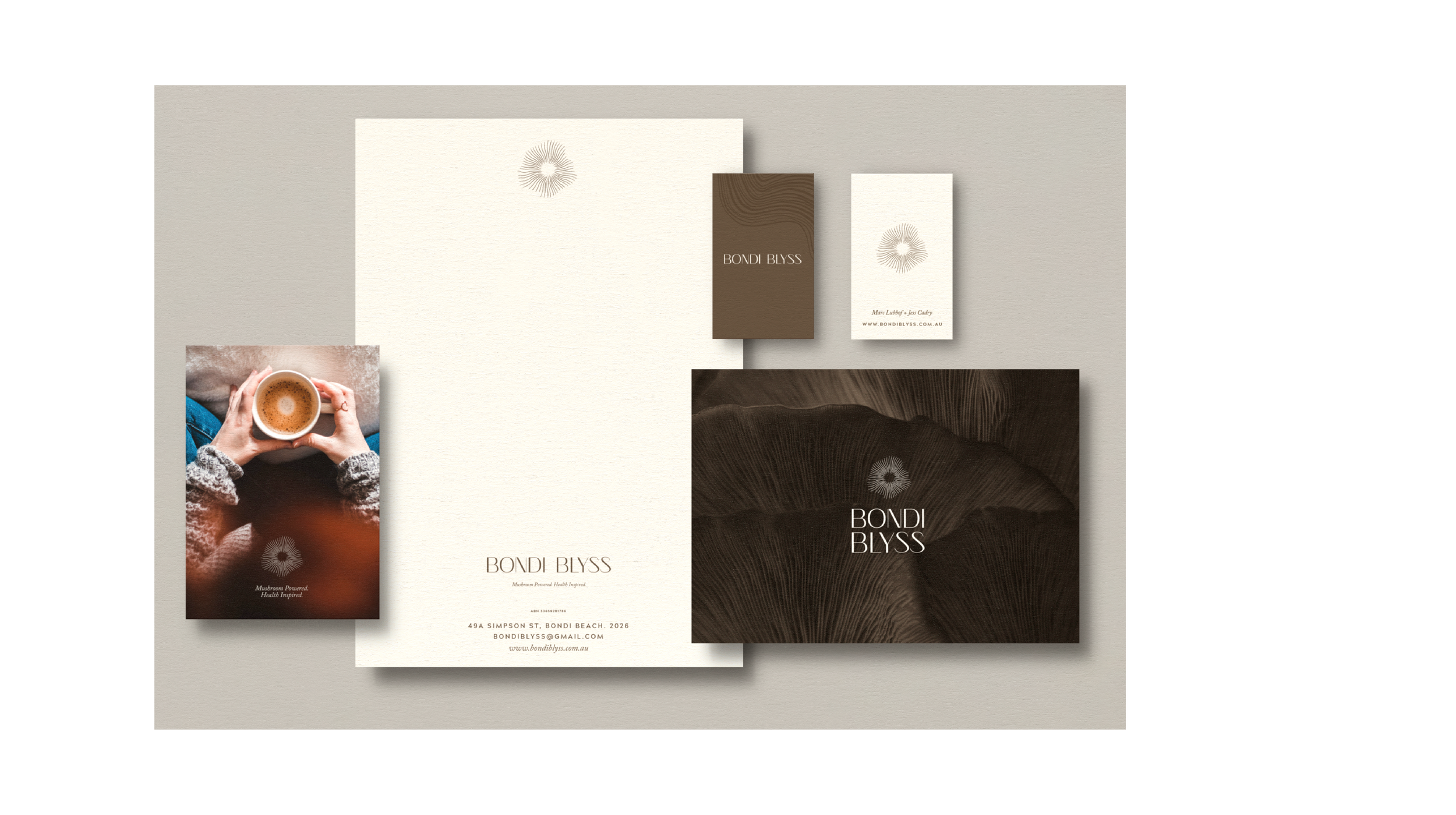 Branding and stationery for Bondi Blyss, featuring a logo with a circular design, a photograph of a person holding a coffee cup, and business cards with neutral and dark brown color schemes.