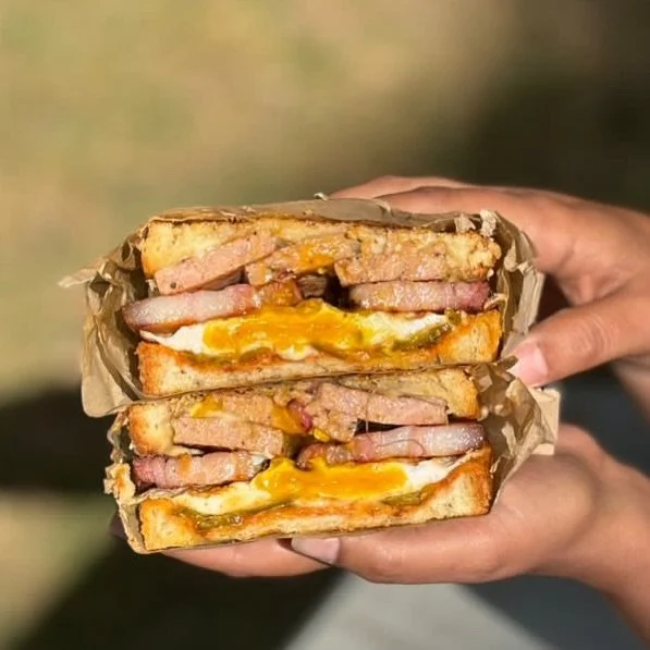 If you&rsquo;re looking for a gut buster, you&rsquo;ve found it. Meet The Crack Sandwich: maple sausage, in-house hickory smoked @crackinbacon, candied jalape&ntilde;os, tomato relish, Havarti cheese, lemon &amp; thyme aioli and a fried egg, all stac