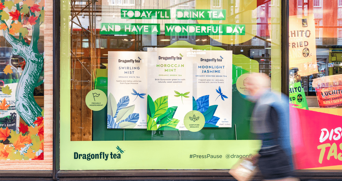 Whole Foods window display for Dragonfly Tea