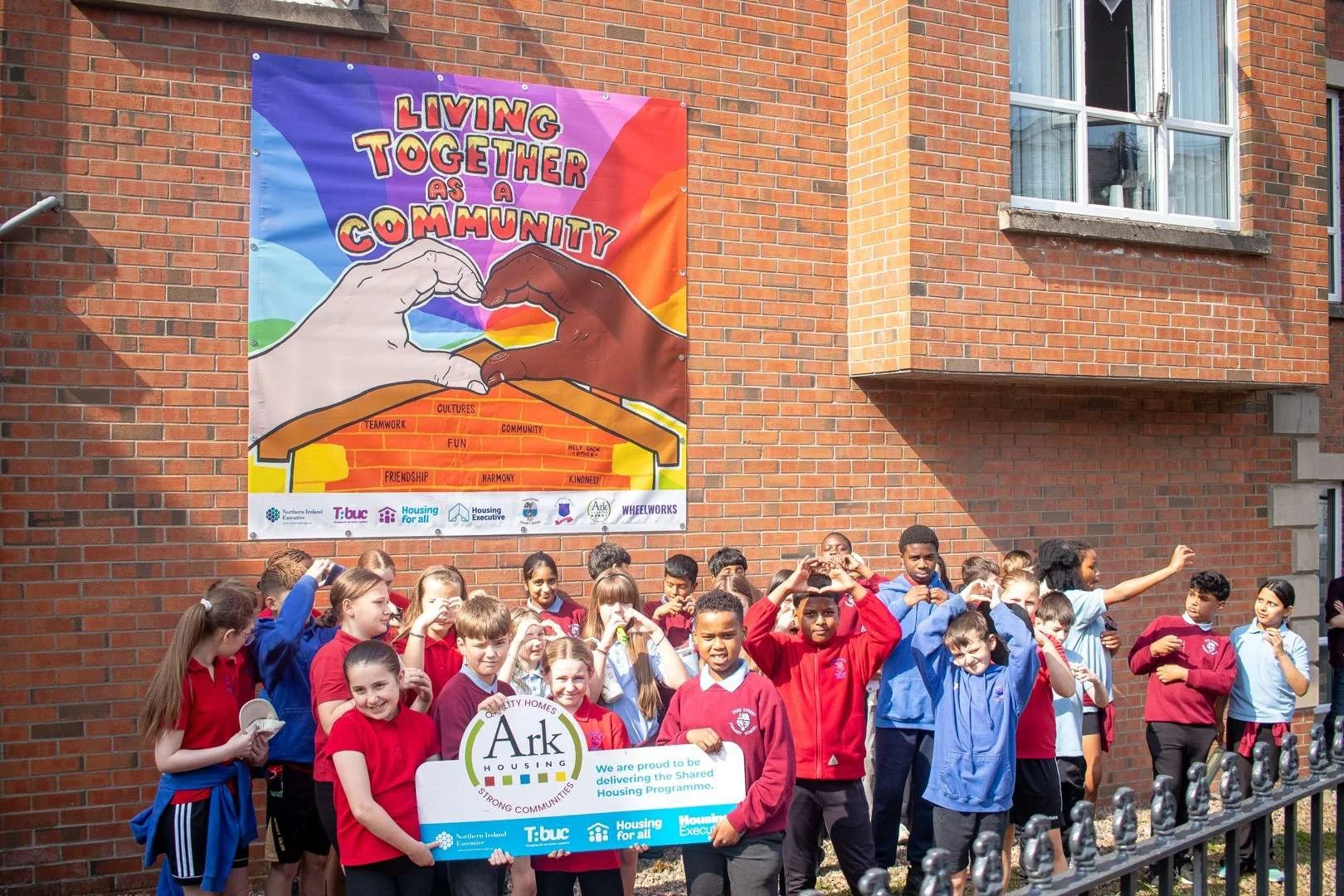 ‘Living Together as a Community’ Mural: Belfast Primary School Kids Unveil New Shared Housing Project&nbsp;