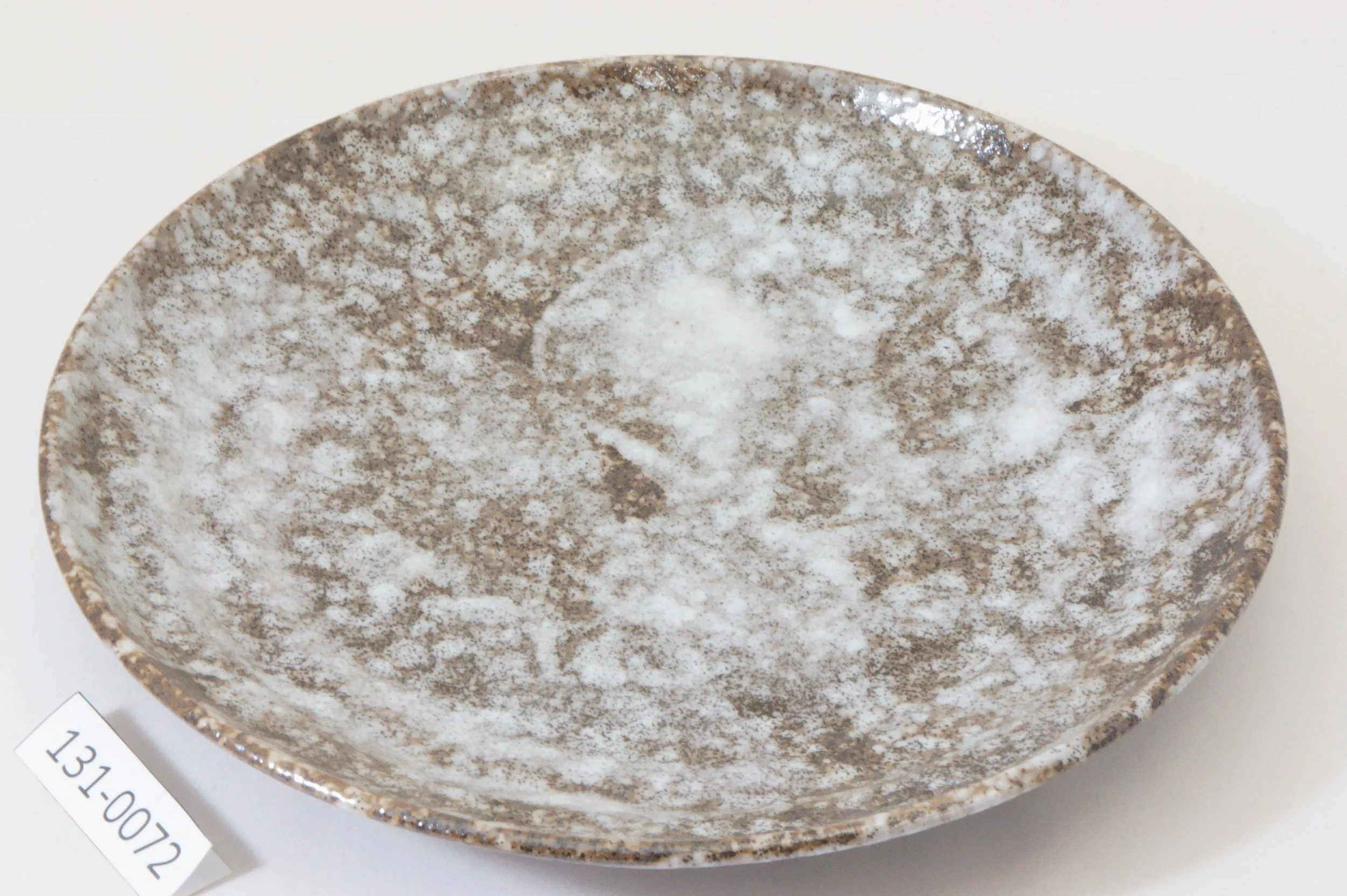 131-0072 White on black plate