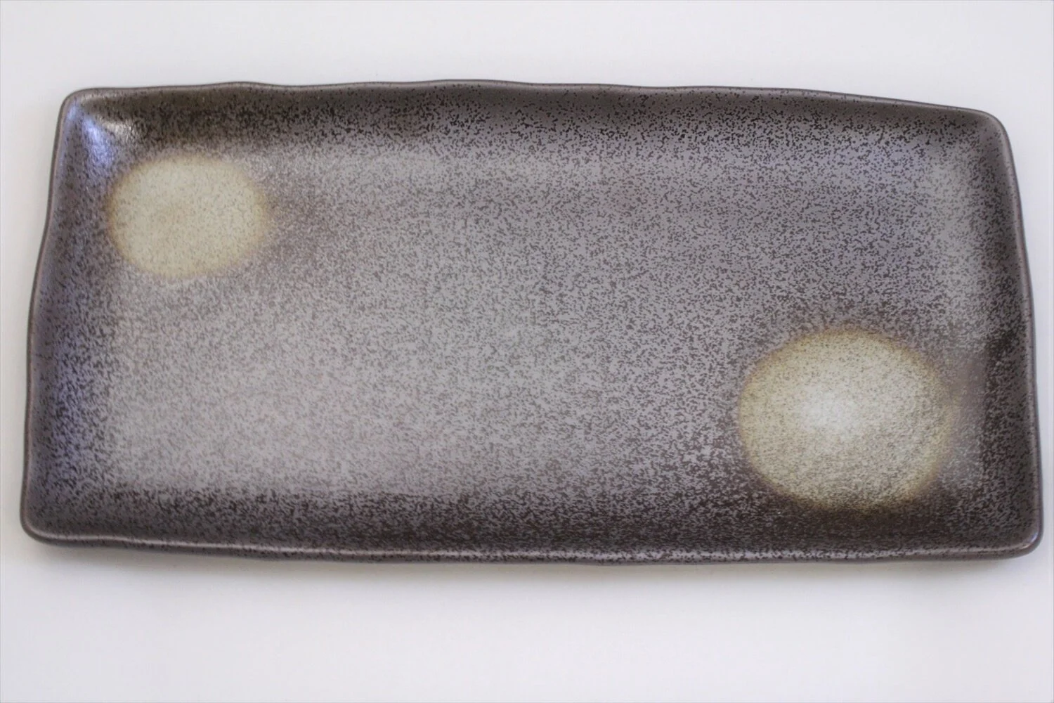 168-6065 Spots on brown Hokke plate