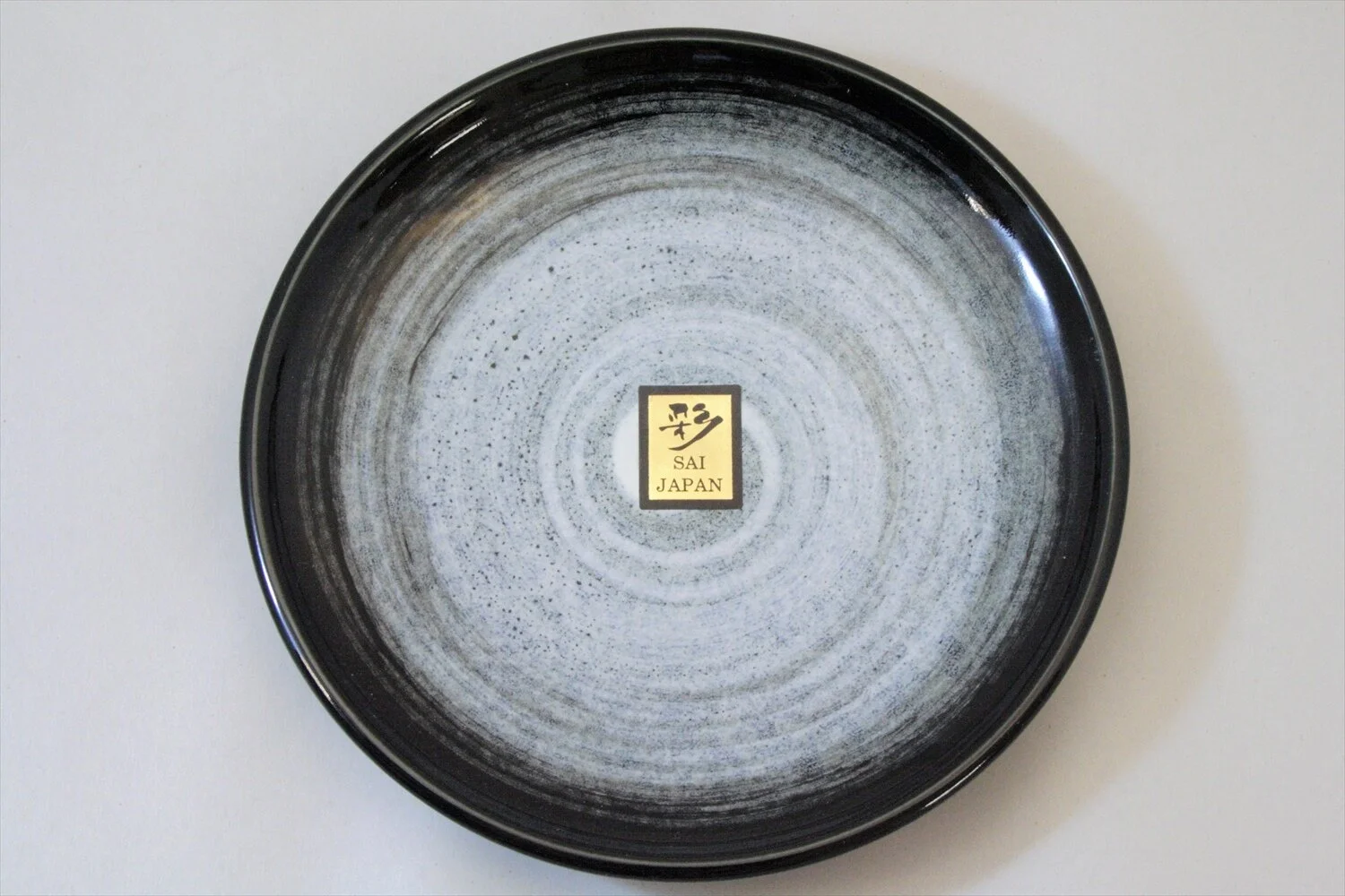 148-3532 Grey on black side plate 17cm