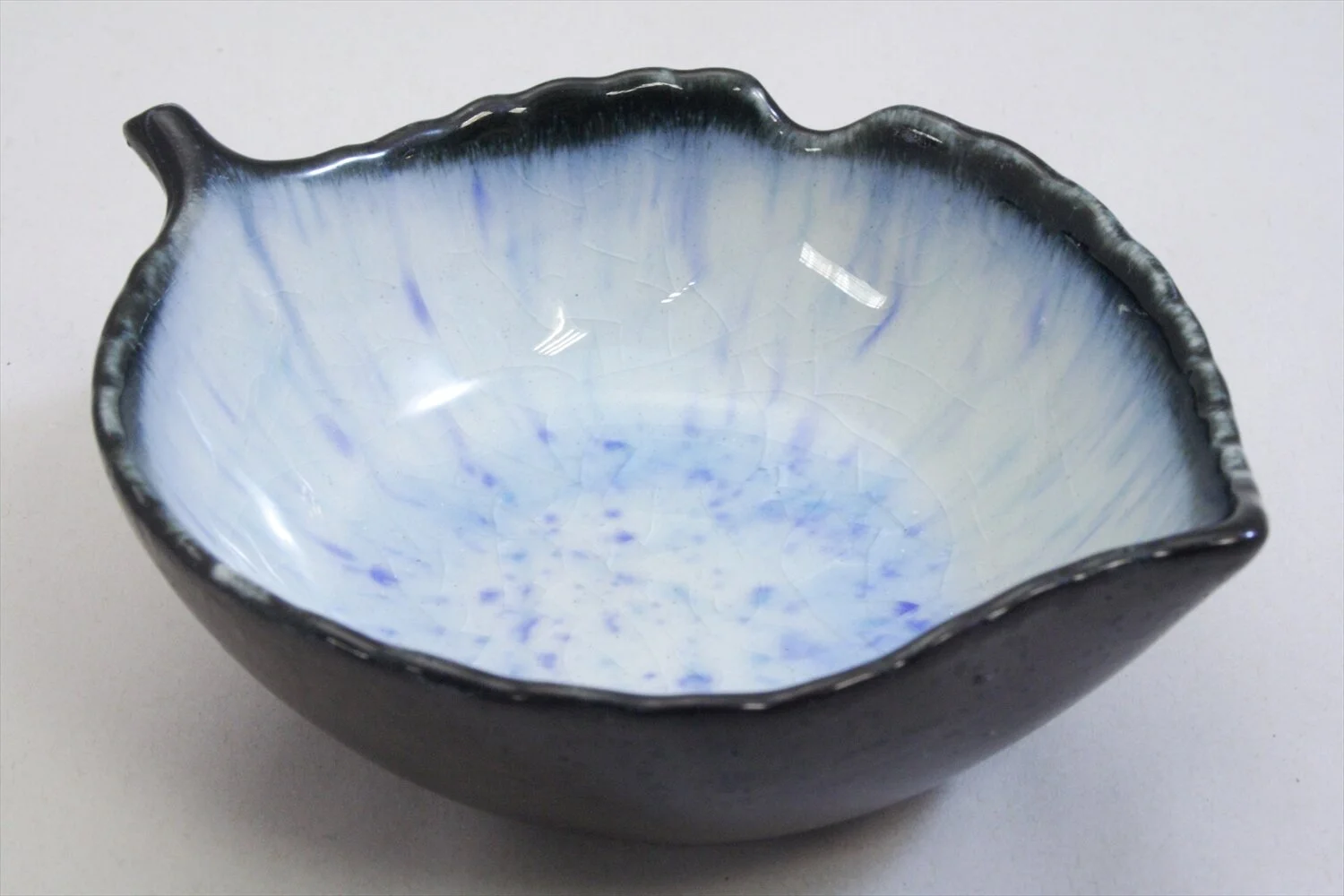 268-6050 Leaf shaped blue on black small bowl