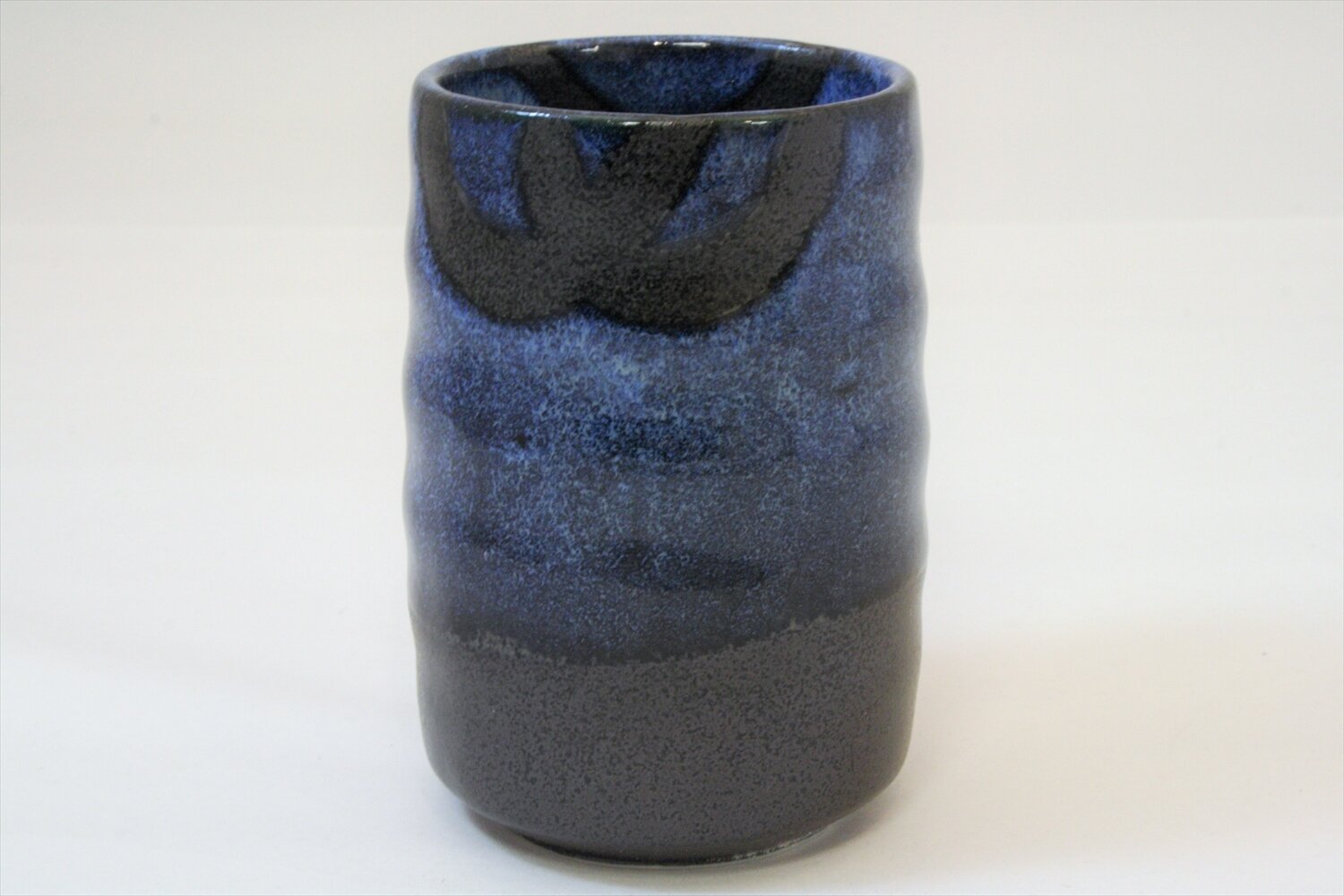 528-3910 Blue on black tall tea cup