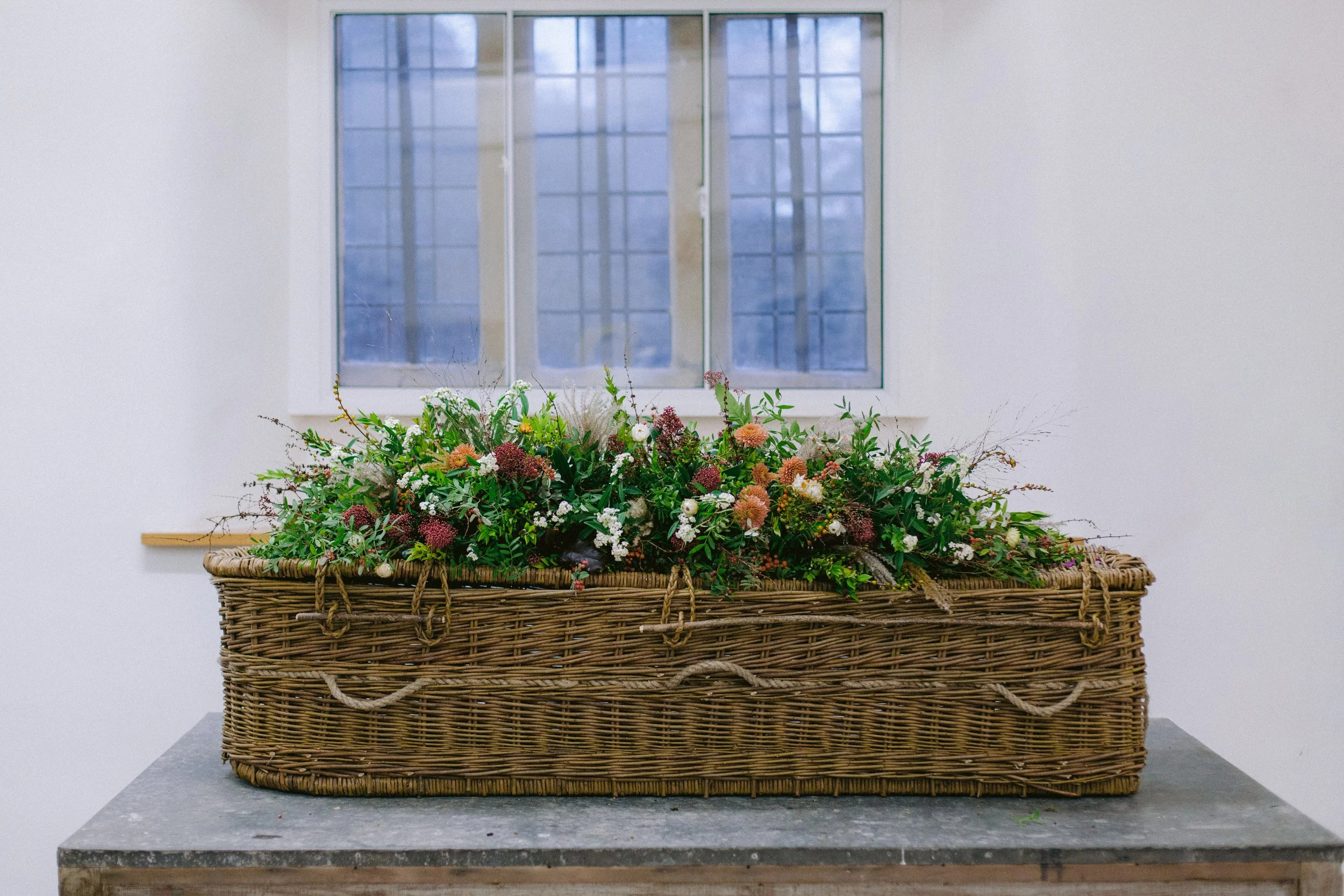 Funeral casket spray made of seasonal British flowers in Berwick-upon-Tweed, Northumberland. Natural and compostable funeral flowers across Northumberland and Scottish Borders.