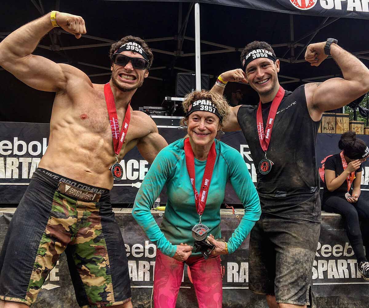 Family photo after completing a Spartan race (mother, age 73)