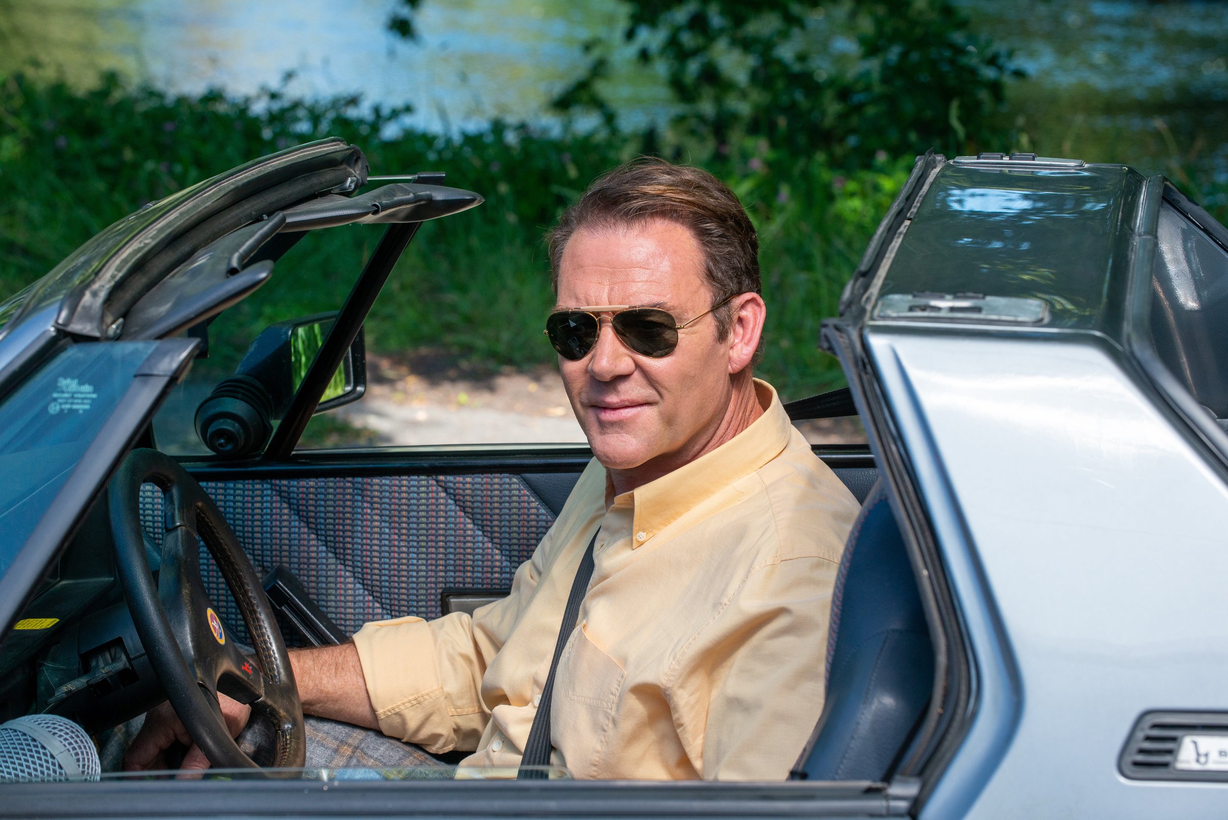 _HS25241_Gordon in the new car low res.jpg
