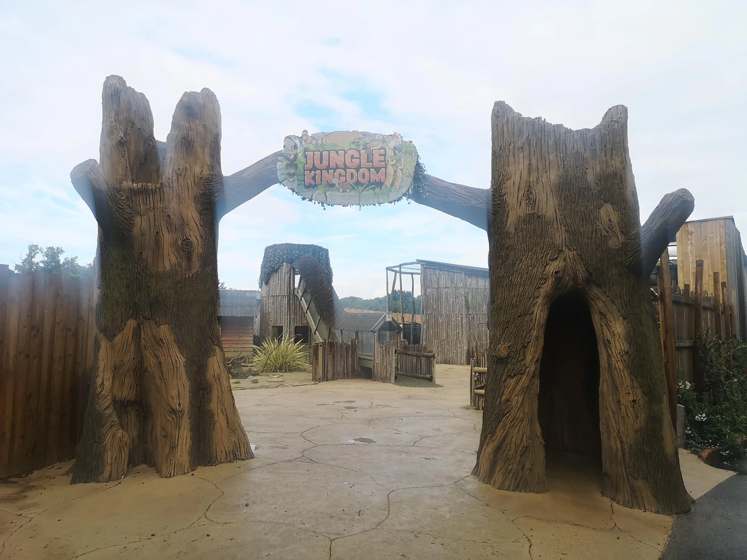 dinosaur themed areas constructed from artificial concrete and faux trees