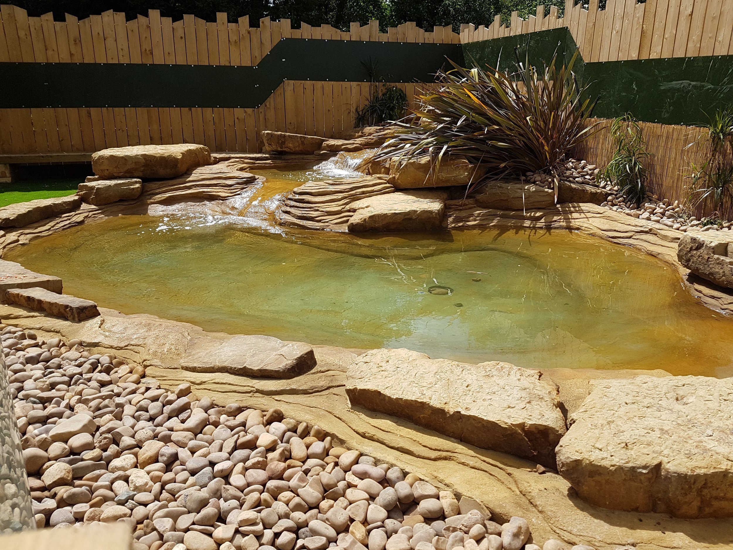 Artificial rock waterfalls and grottos by unreal productions uk