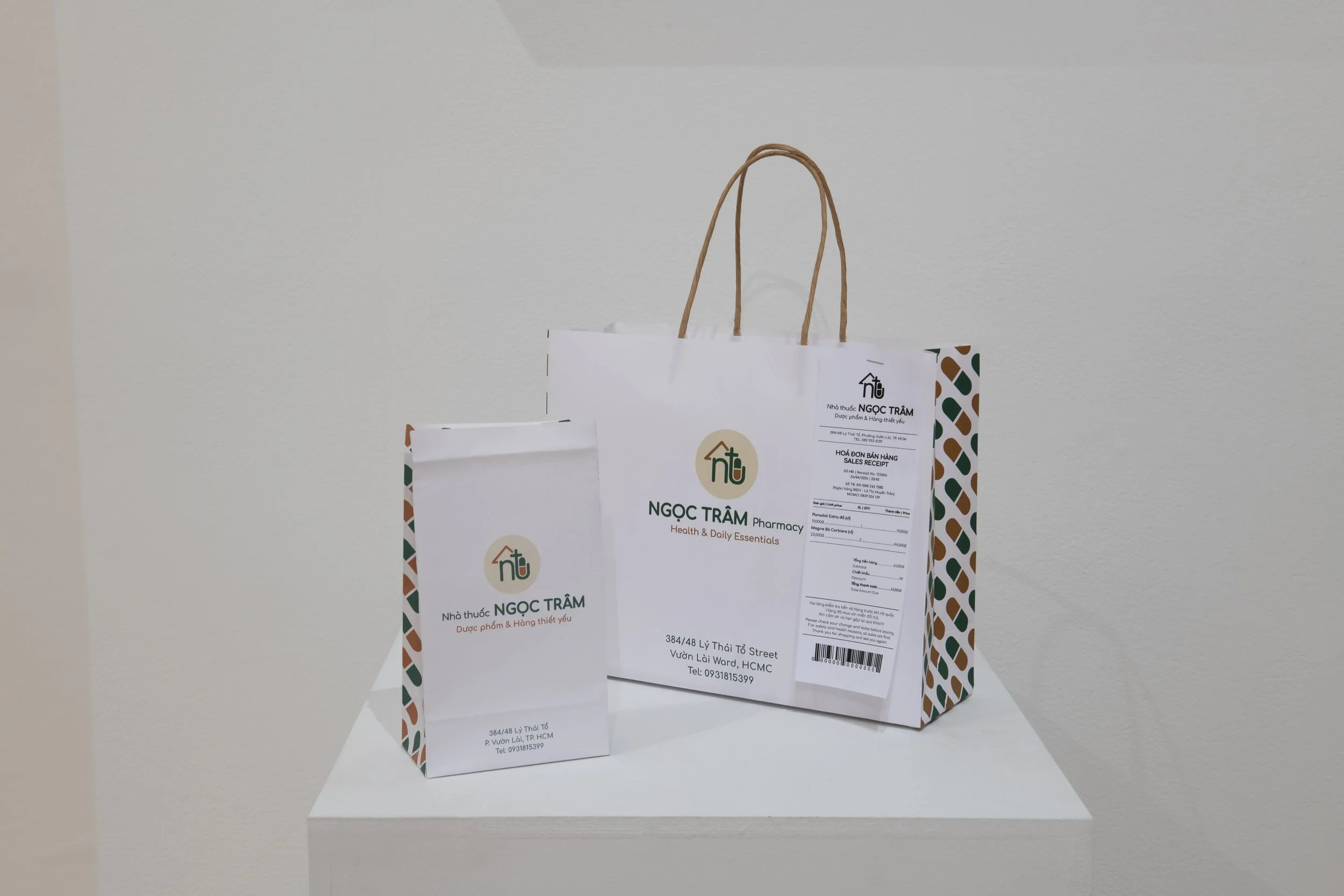 "Ngoc Tram Pharmacy: A Neighborhood Health and Essentials Brand" (detail) 
Bilingual pharmacy shopping bags and receipt. Inkjet print on paper, paper bags, and printed receipt. Dimensions variable. 
Photo credit: John Carlano