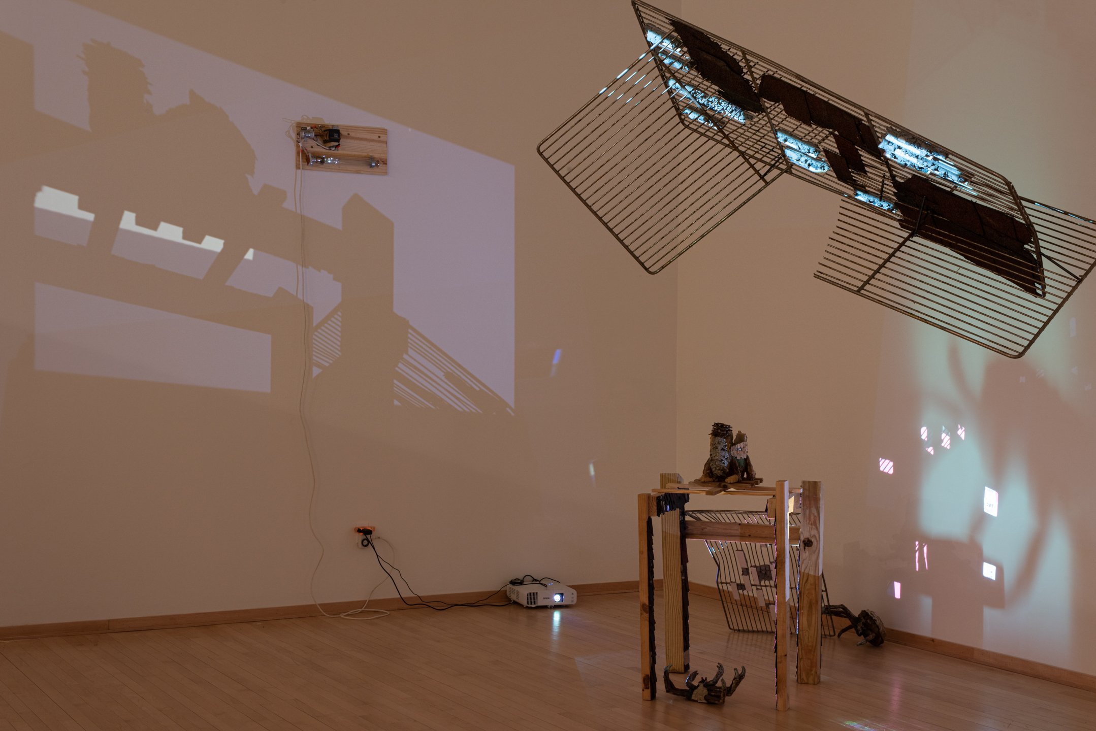 "To What New Place,"
Installation View
Reclaimed, construction materials, ceramic, low-pressure sodium light, multi-channel projection and sound.
Dimensions Variable
Photo Credit: Neighboring States